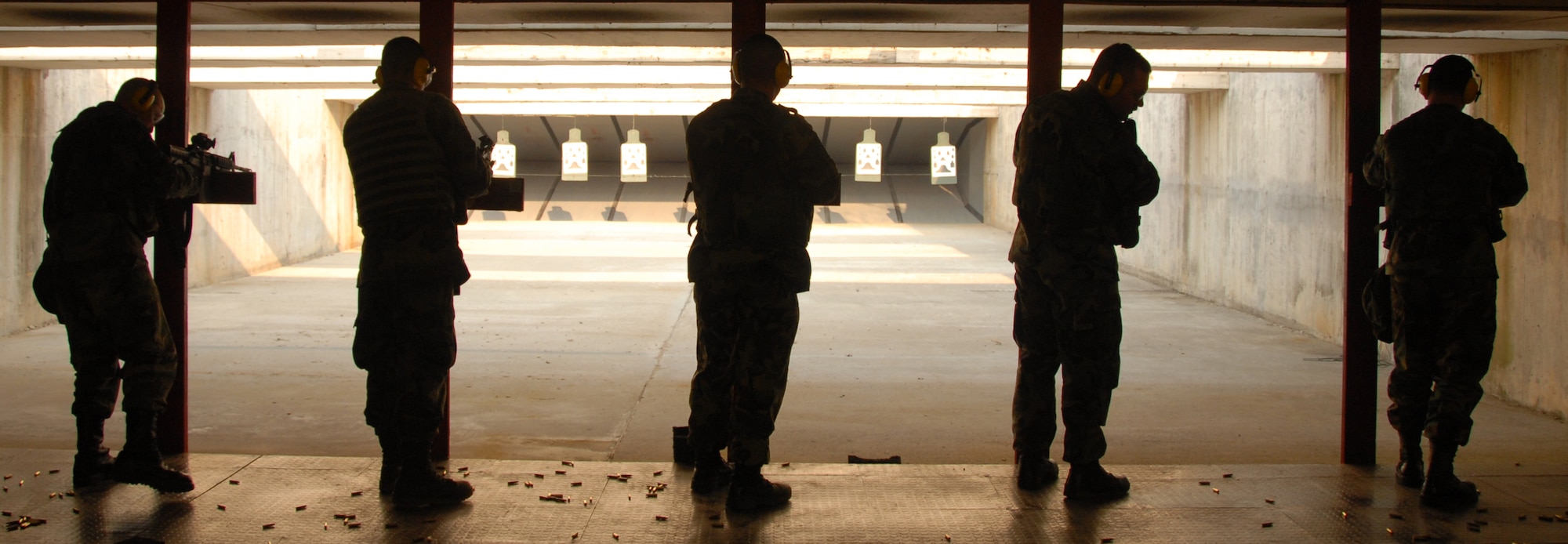 OSAN AIR BASE, Republic of Korea --  Airmen here hone their skills at the rifle range March 15. Air Force members visit the range annually to maintain readiness in the event of war. (U.S. Air Force photo by Airman 1st Class Chad Strohmeyer)