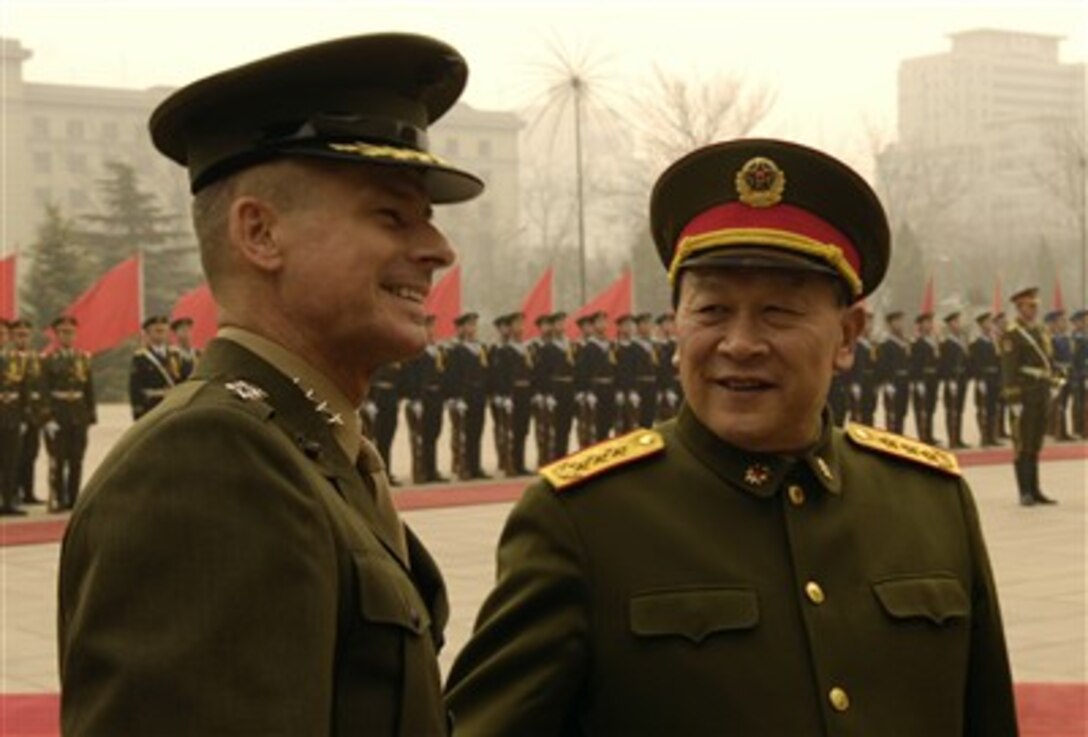Chairman of the Joint Chiefs of Staff U.S. Marine Gen. Peter Pace participates in a ceremony hosted by his Chinese counterpart, Gen. Liang Guangile, during a visit to the Ministry of Defense in Beijing, March 22, 2007. 