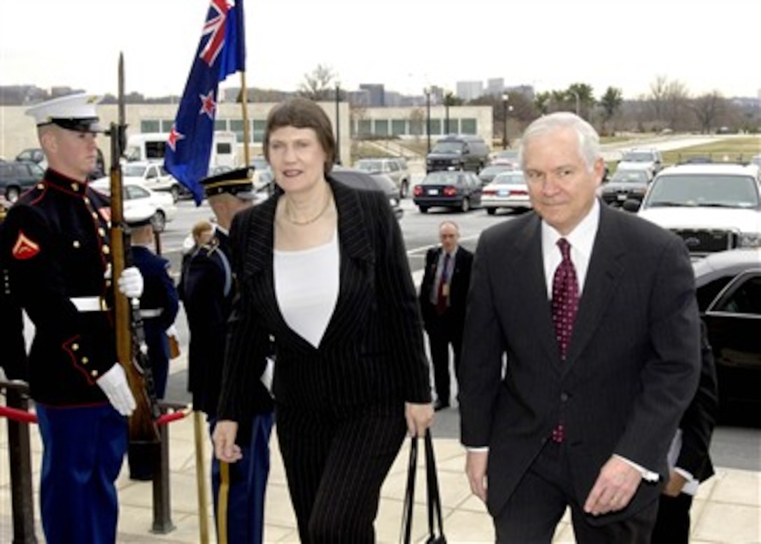 Secretary of Defense Robert M. Gates (right) escorts New Zealand's Prime Minister Helen Clark (left) through an honor cordon and into the Pentagon for security discussions on March 21, 2007.  