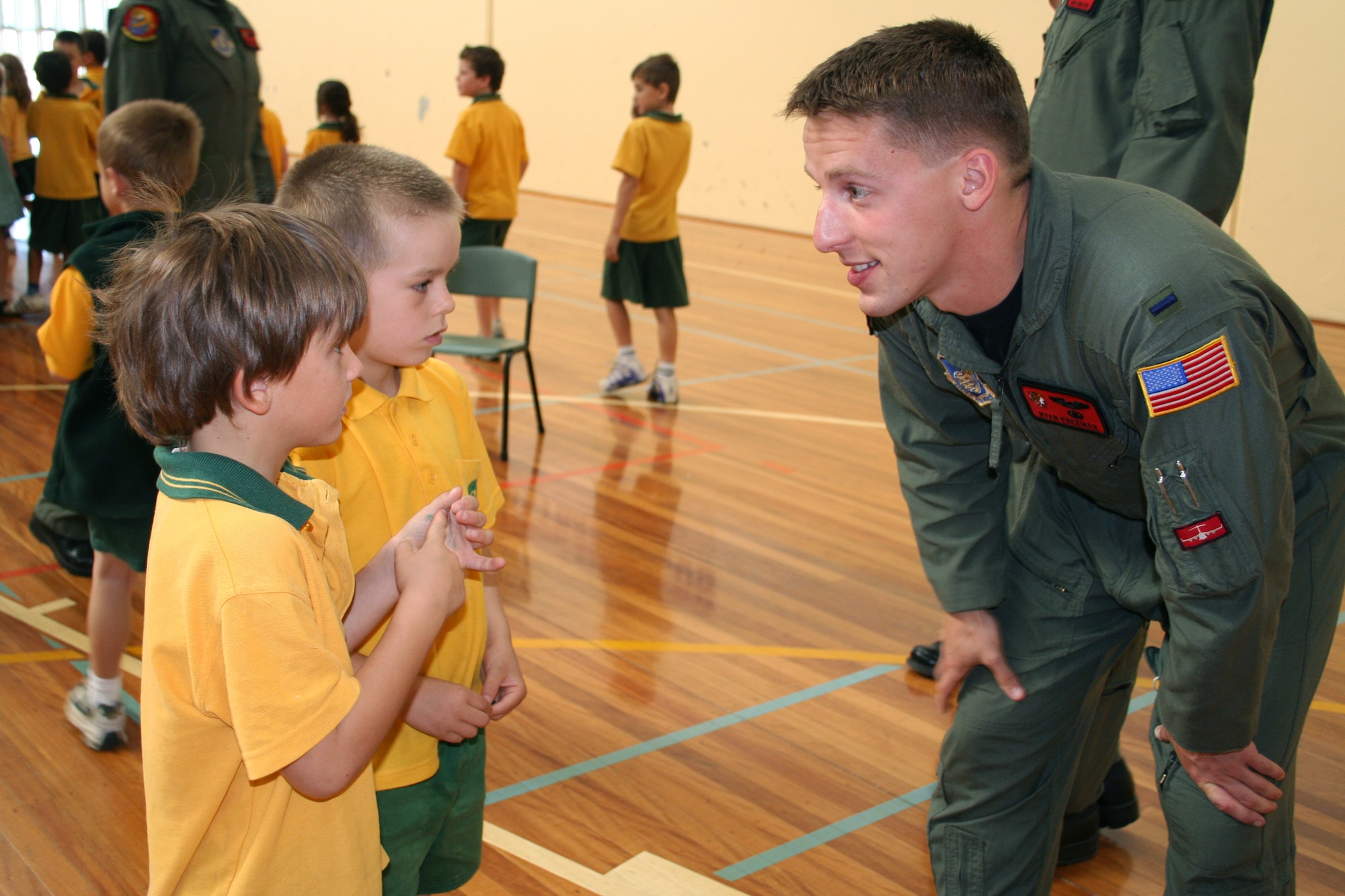 First Lt. Ryan Freeman answers questions about being an Air Force pilot March 22 at the Lara Primary School in Victoria, Australia. Pacific Air Forces Airmen are in Australia supporting the Australian International Airshow 2007. Lieutenant Freeman a pilot with the 535th Airlift Squadron at Hickam Air Force Base, Hawaii. (U.S. Air Force photo/Capt. Yvonne Levardi) 