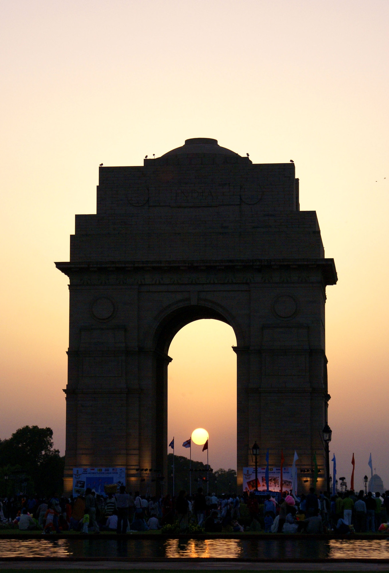 The sun sets behind the India Gate in New Delhi March 17, setting the stage for the evening portion of the Indian Air Force Platinum Jubilee Tattoo. The Pacific Air Forces rock band Pacific Trends was invited to take part in the multinational celebration, which included military bands from India, Singapore, Sri Lanka and Thailand. The IAF celebrates its 75th birthday this year. (U.S. Air Force photo/Marine Cpl. Ashleigh Bryant) 