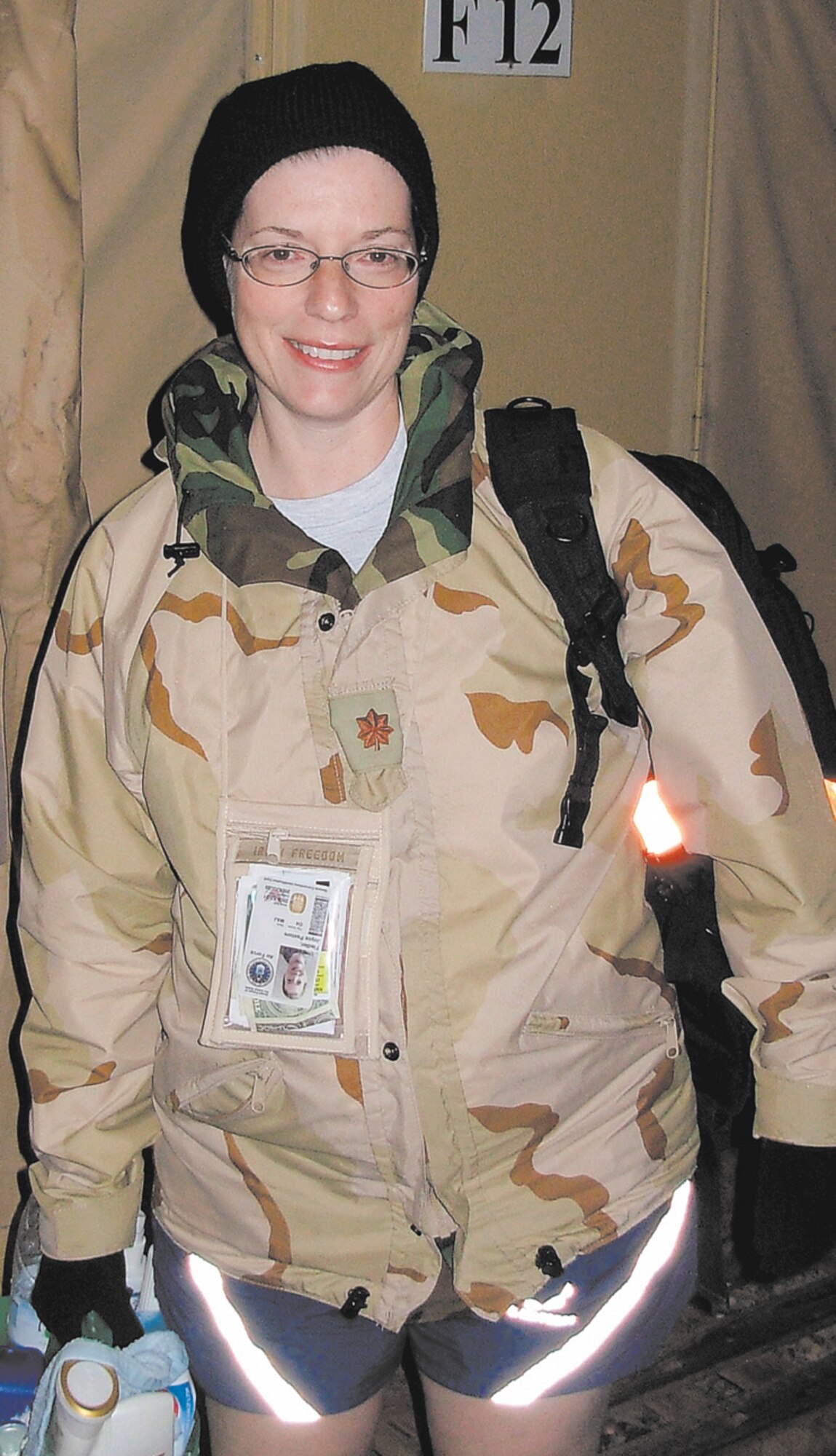 Maj. Joyce Fiedler heads to the showers while she was deployed to Southwest Asia.