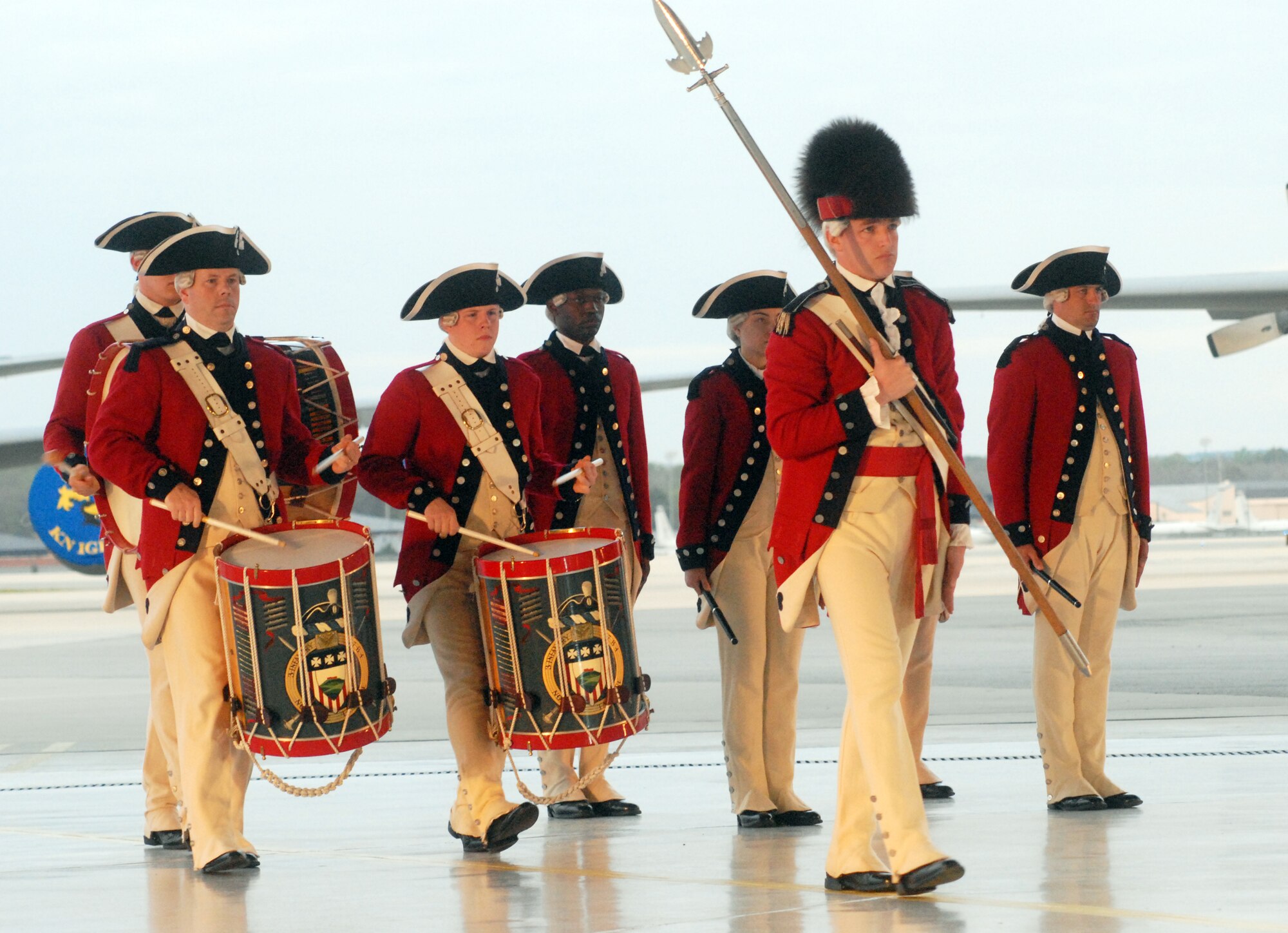 The Old Guard Fife and Drum Corps perform in uniforms patterned after Gen. George Washington's Continental Army. The group reenacted the custom of the Tattoo. U. S. Air Force photo by Sue Sapp