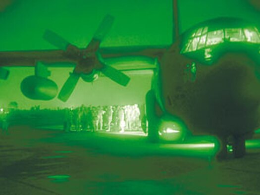 A C-130 sits on the airfield at Baghdad International Airport, waiting to move American troops out of the Iraqi capital. Courtesy photo