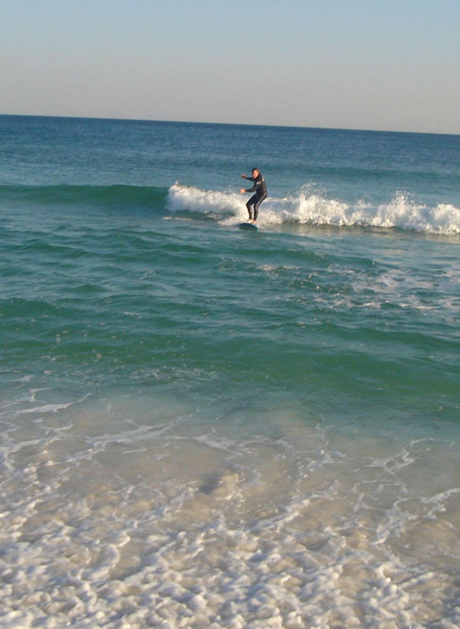 Staff Sgt. Michael Passmore, a gunner with the 16th Special Operations Squadron, enjoys his favorite pastime - surfing. His hobby recently turned into a life-saving mission where he rescued three children from the Gulf of Mexico. (Courtesy photo)