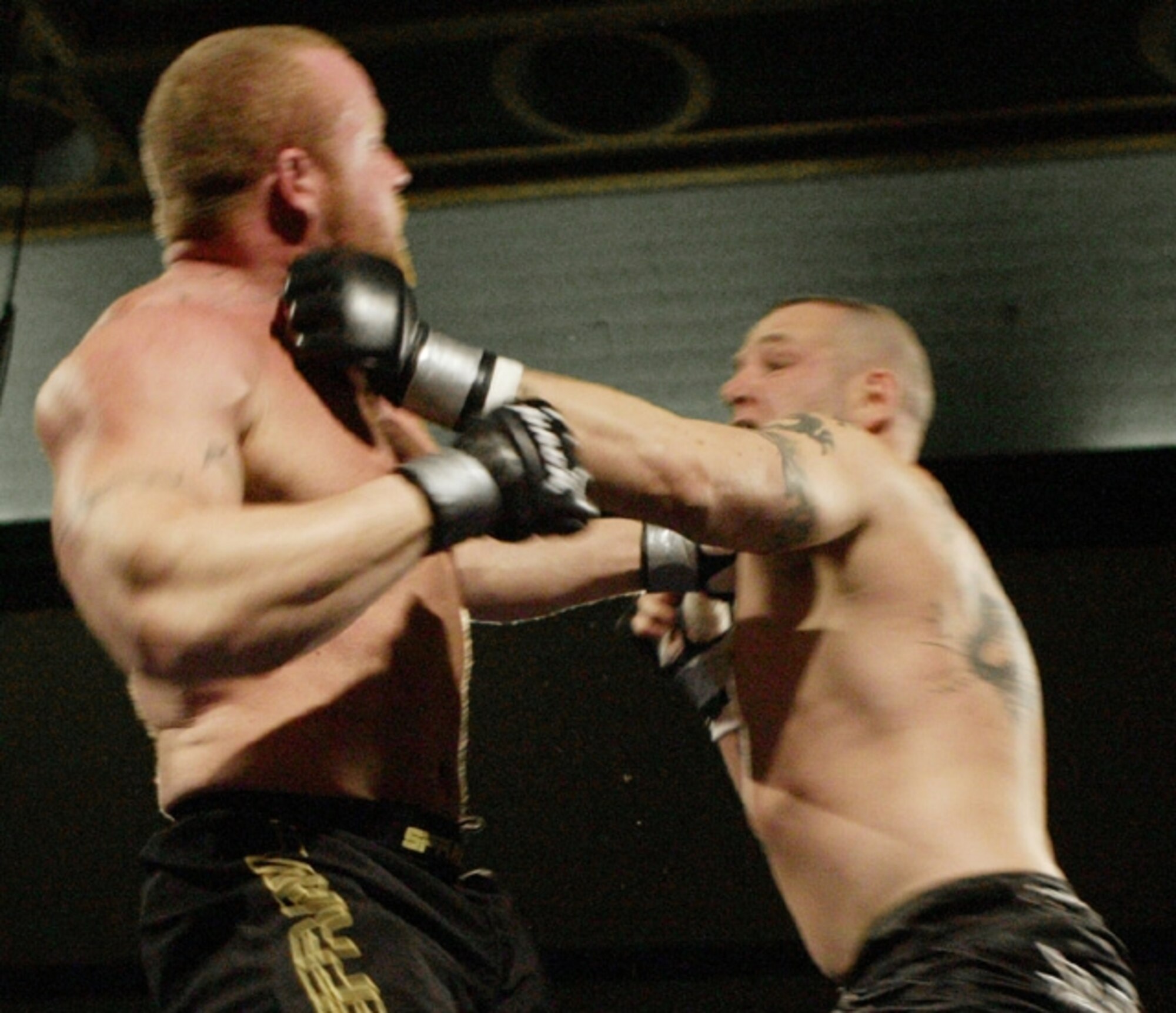 Staff Sgt. Lewis Pascavage III,  305th MXG quality assurance inspector, lands a left jab on his opponent.