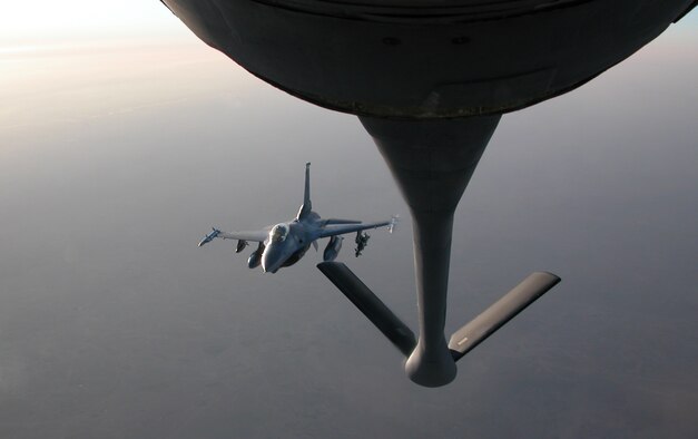 An F-16 approaches a KC-135 Stratotanker from the 379th Air Expeditionary Wing 340th Expeditionary Air Refueling Squadron for refueling. The 340th EARS transfers significant amounts of fuel to a variety of Coalition aircraft throughout the entire AOR with an aircraft that is oftentimes double the age of the Airmen who fly and maintain it. (U.S. Air Force photo)