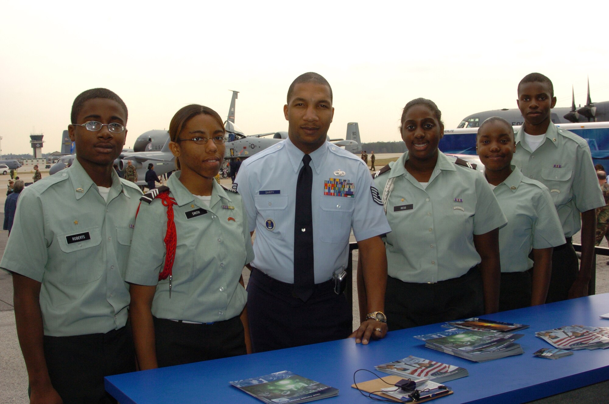 Tech. Sgt. Keenan Sarpy, 331st Recruiting Squadron, Gunter/Maxwell Air Force Base, Ala.,  provides Army JROTC cadets (left to right) Pfc Jamelle Roberts, Staff Sgt Lakeysha Smith, Cpl. Justiya Reid, Pfc. Tiffany Barkley and Pfc. Eric Hardin information on Air Force opportunities.  Sergeant Sarpy was one of several recruiters who interacted with JROTC cadets during JROTC Week, March 12-15, at Dobbins Air Reserve Base.  The event is part of the Air Force 60th Anniversary celebration. "Events like this provide a positive impact on JROTC cadets who are considering a career in the military," said Sergeant Sarpy. (U.S. Air Force photo/Master Sgt. Stan Coleman)