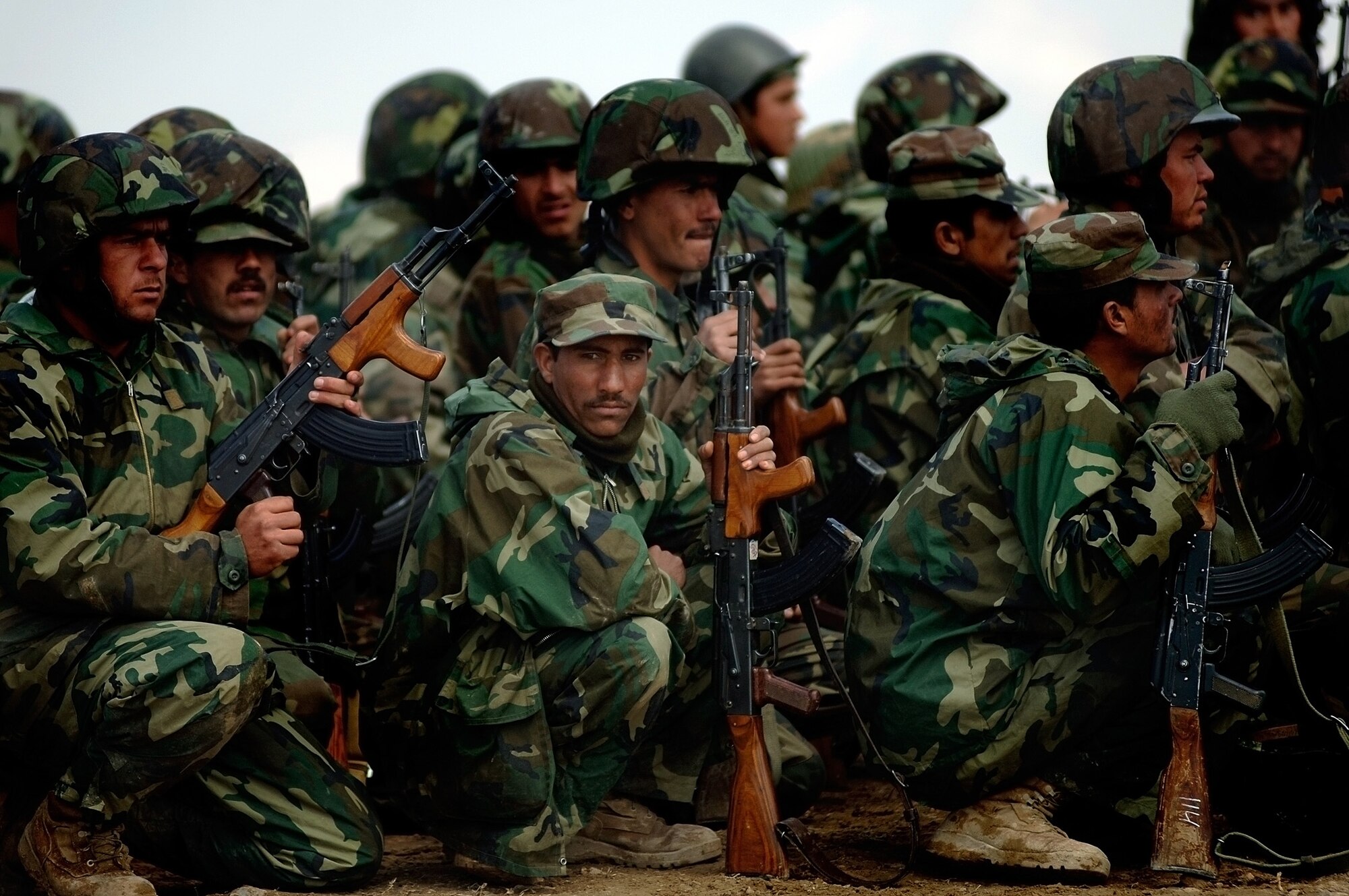 Afghan National Army trainees prepare to learn perimeter security during training at the Kabul Military Training Center, or KMTC.   Approximately 19 U.S. Air Force members provide guidance and mentorship for the instructors, officers and trainees at KMTC.  The ISAF and the U.S. military  provide the maximum amount of guidance for the Afghan National Army to independently sustain the security of its own country.  (U.S. Air Force photo/Tech. Sgt. Cecilio M. Ricardo Jr.) 