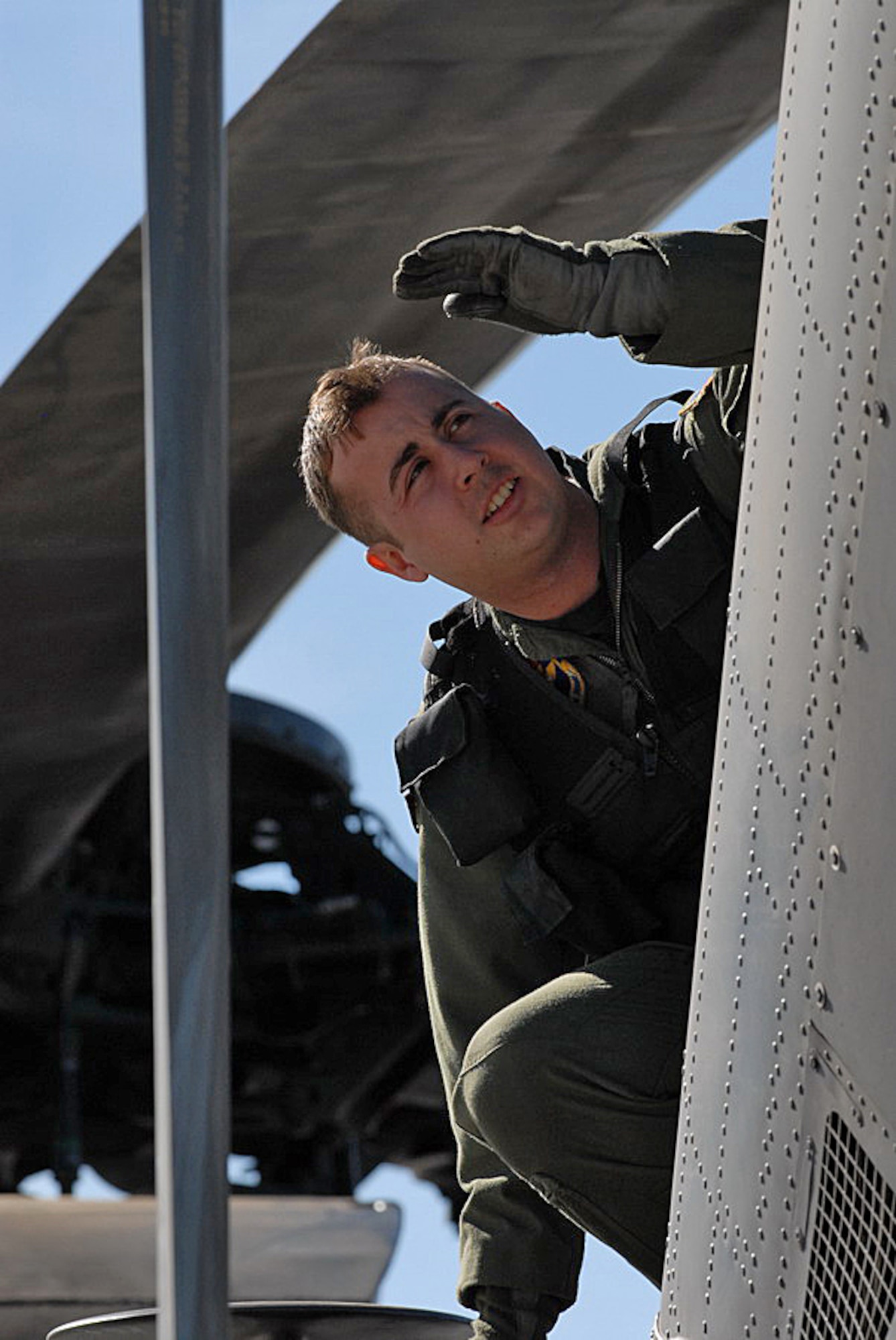 Staff Sgt. Peter Cunningham, a student at the 551st Special Operations Squadron, performs a preflight inspection on an MH-53 Pave Low. There are 12 students remaining in the squadron, and the last of them are due to leave by the end of March. (U.S. Air Force photo by Laurence Zankowksi)