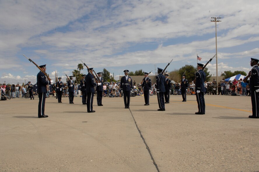 The United States Air Force Honor Guard Drill Team performs during the Luke Air Force Base Air Show in Arizona on March 24, 2007. The Drill Team is the traveling component of the Air Force Honor Guard and tours Air Force bases world wide showcasing the precision of today's Air Force to recruit, retain, and inspire Airmen for the Air Force mission. (U.S. Air Force photo by Airman 1st Class Rusti Caraker)(Released)