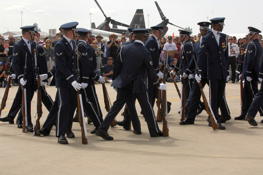 The United States Air Force Honor Guard Drill Team performs during the Luke Air Force Base Air Show in Arizona on March 24, 2007. The Drill Team is the traveling component of the Air Force Honor Guard and tours Air Force bases world wide showcasing the precision of today's Air Force to recruit, retain, and inspire Airmen for the Air Force mission. (U.S. Air Force photo by Airman 1st Class Rusti Caraker)(Released)