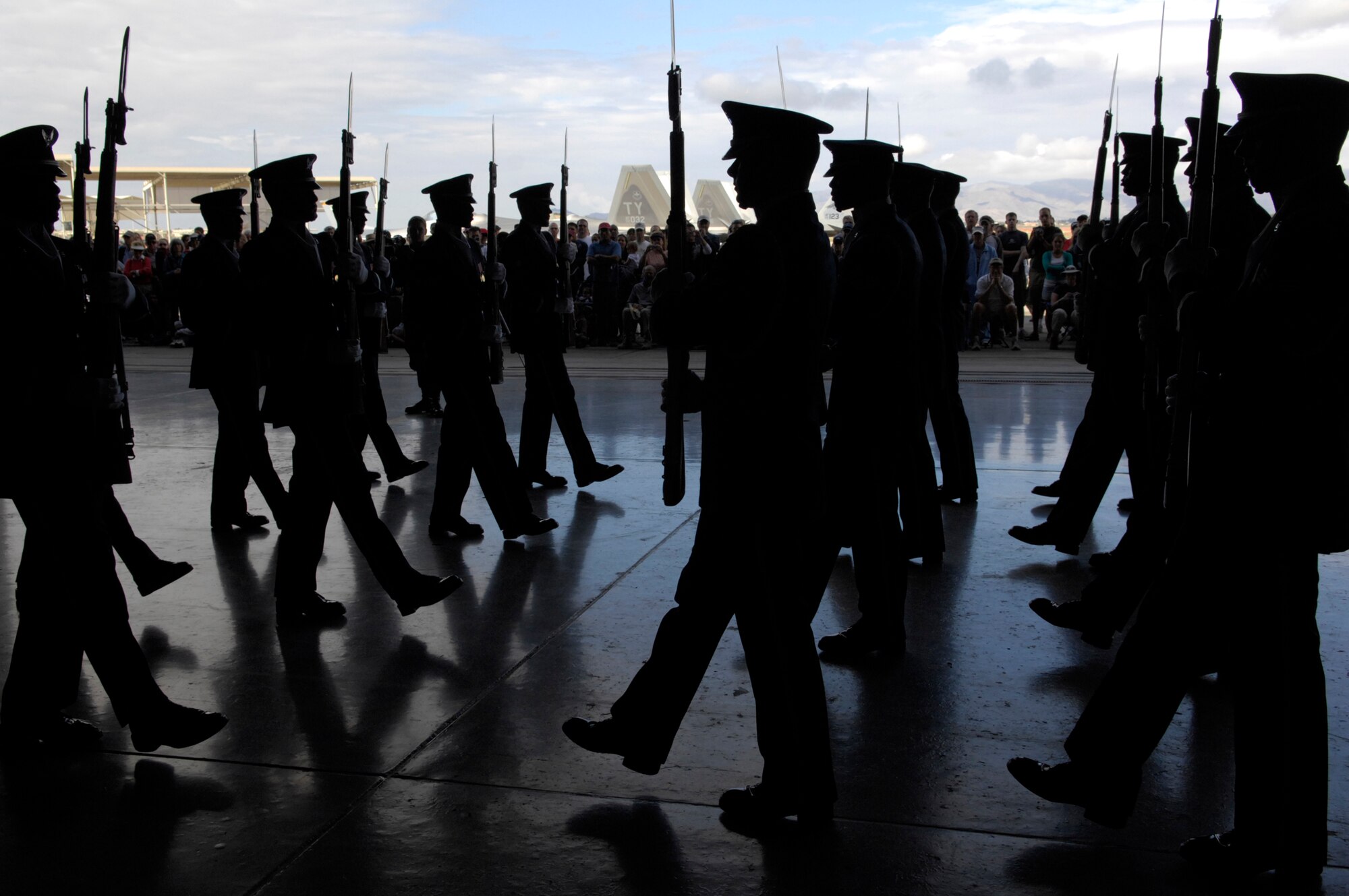 The United States Air Force Honor Guard Drill Team performs during the Luke Air Force Base Air Show in Arizona on March 24, 2007. The Drill Team is the traveling component of the Air Force Honor Guard and tours Air Force bases world wide showcasing the precision of today's Air Force to recruit, retain, and inspire Airmen for the Air Force mission. (U.S. Air Force photo by Airman 1st Class Rusti Caraker)(Released)