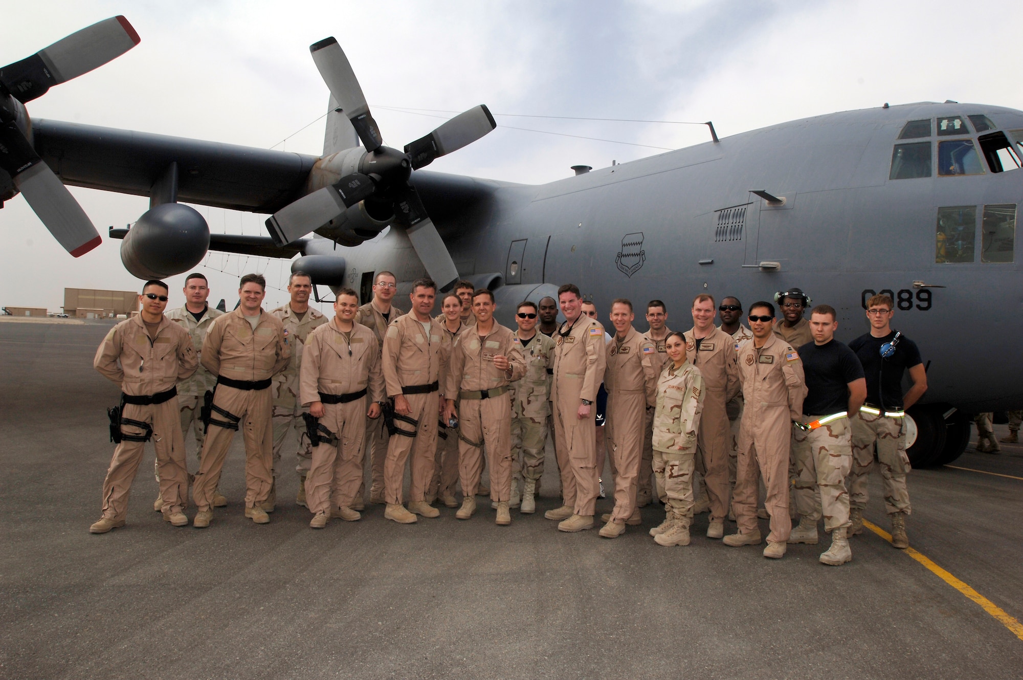 SOUTHWEST ASIA -- Newly awarded command pilot Col Ronald J. Celentano poses for a group photo with the flight crew he surpassed the 3000 hour mark with.  Col Celentano surpassed the 3000 flying hour milestone on Friday, 23 Mar 07 to earn his command pilot wings. (U.S. Air Force photo by Tech. Sgt. Edward D. Holzapfel) (Released)