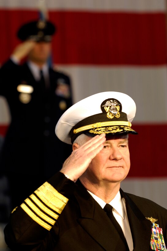 U.S. Navy Adm. Timothy J. Keating salutes during the presentation of Command as part of the U.S. Northern Command change of command ceremony at Peterson AFB, Colo., March 23, 2007.