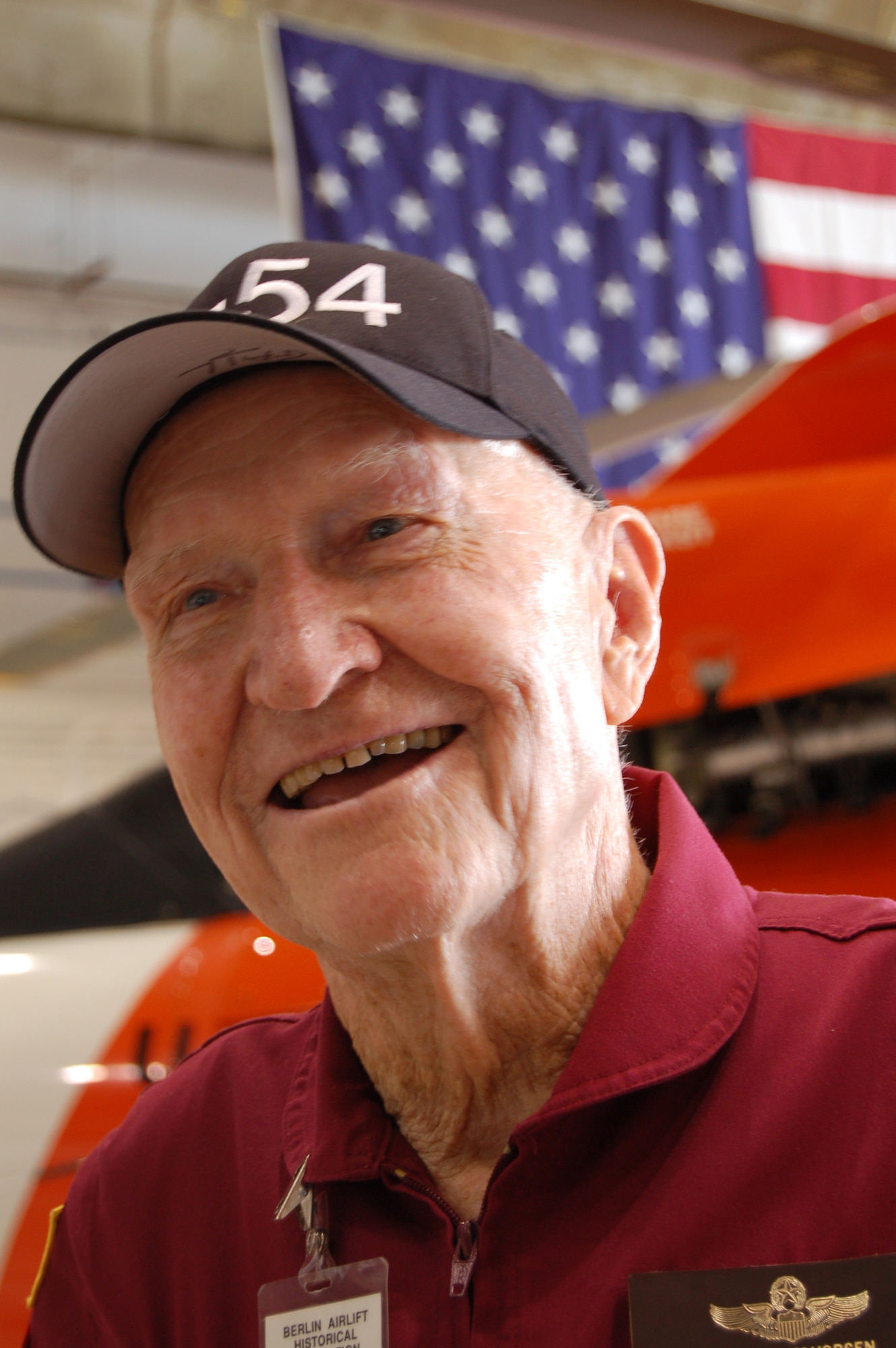 Retired Col. Gail Halvorsen returned to the former Ramey Air Force Base for the first time since 1949 March 22 at what is now Coast Guard Air Station Borinquen, Puerto Rico. Colonel Halvorsen, also known as the Berlin Candy Bomber, flew C-54 Skymasters during the Berlin Airlift and parachuted candy to children from his airplane. The colonel signed autographs and showed children how he tied candy to parachutes made from handkerchiefs during the air station's open house. Approximately 500 people from local schools, family members and members of the Ramey AFB Historical Association got a firsthand look at military equipment including a C-54. (U.S. Air Force photo/Tech. Sgt. Ben Gonzales)