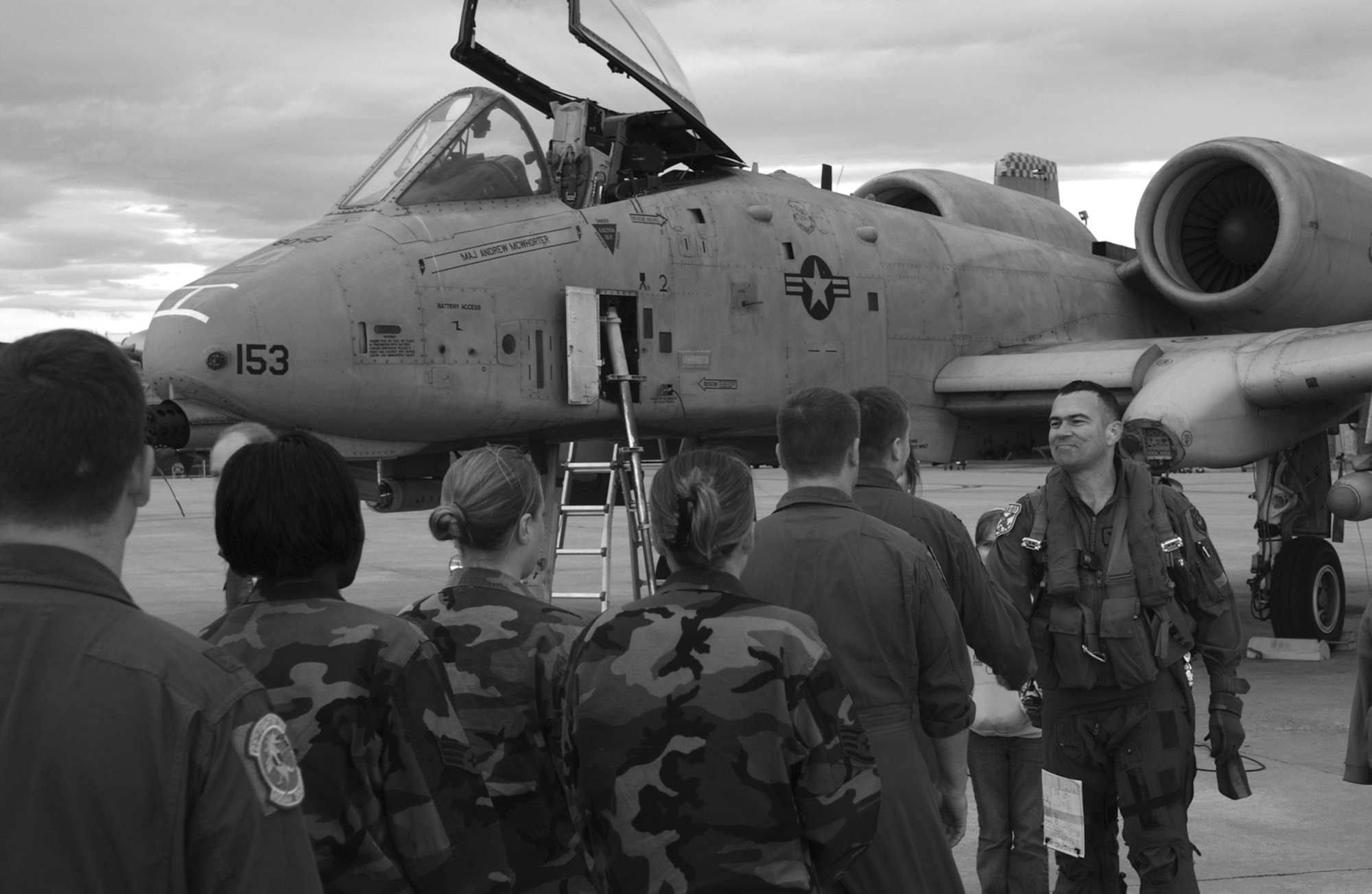 OSAN AIR BASE, Reubplic of Korea --   Lt. Col. Jack “Padre” Stokes, 25th Fighter Squadron commander, shakes hands with well-wishers Monday after he marked his 3,000th hour flying the A-10. Lt. Col. Stokes originally flew his first hours in an A-10 while stationed at Osan. During the flight, he was partnered with Capt. Gabe “D-Day” Normandia, chief of aircrew training, 51st Operations Support Squadron, who was marking his 1,000th hour in the F-16. The mission profile called for Lt. Col. Stokes to serve as a forward air controller for Captain Normandia. Photo by Airman 1st Class Chad Strohmeyer