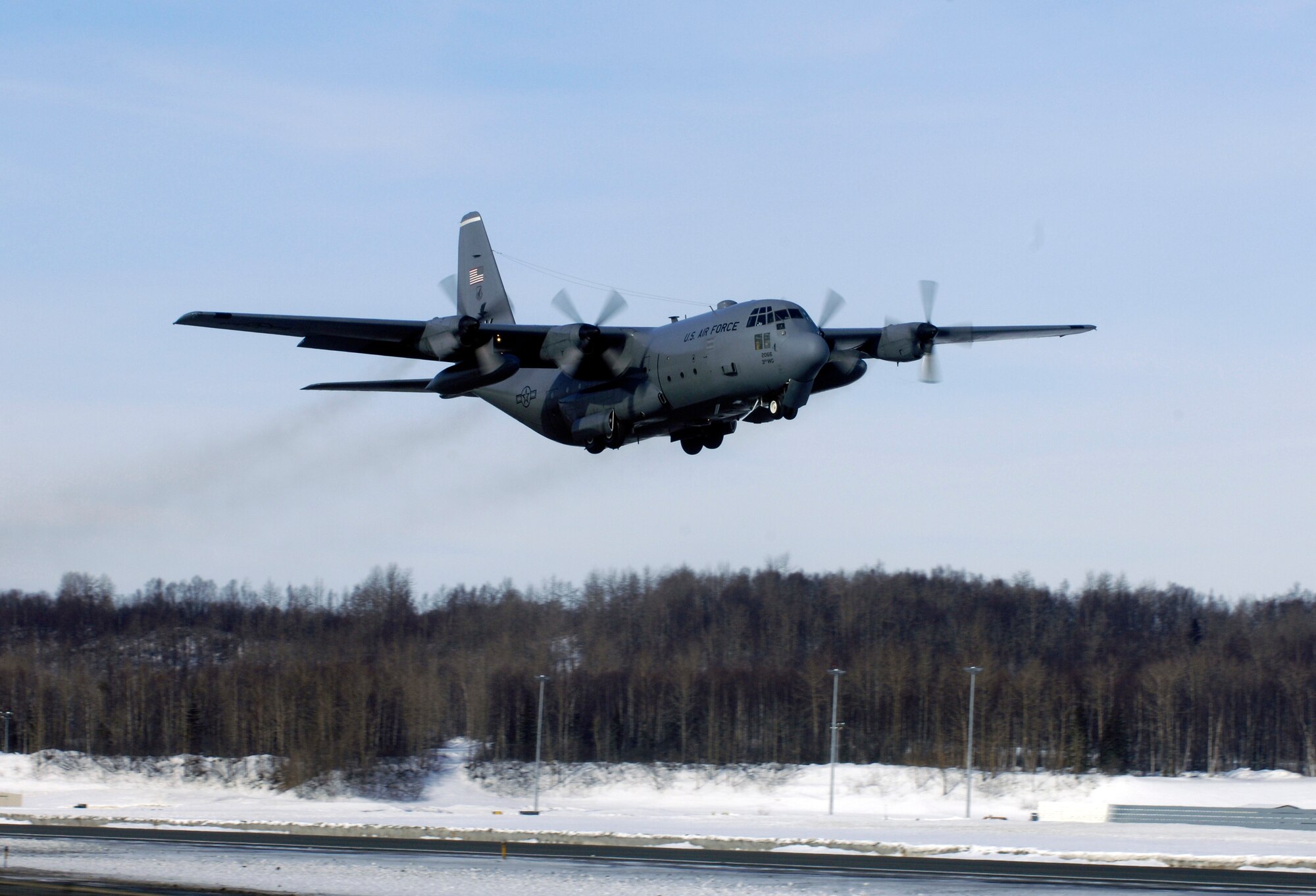 ELMENDORF AIR FORCE BASE, Alaska -- The last C-130 from 517th Airlift Squadron takes off from here heading to Yokota Air Base, Japan. After 43 years of continuous service in Alaska, the C-130 is leaving to fulfill a reorganization of aircraft basing to make its mission more efficient. The 517th AS is converting C-17s and the C-130s relocating to Yokota AB will replace the "E" models and will add two more "H" models to Dyess Air Force Base, Texas, fleet. (U.S. Air Force photo by Airmen 1st Class Jonathan Steffen)