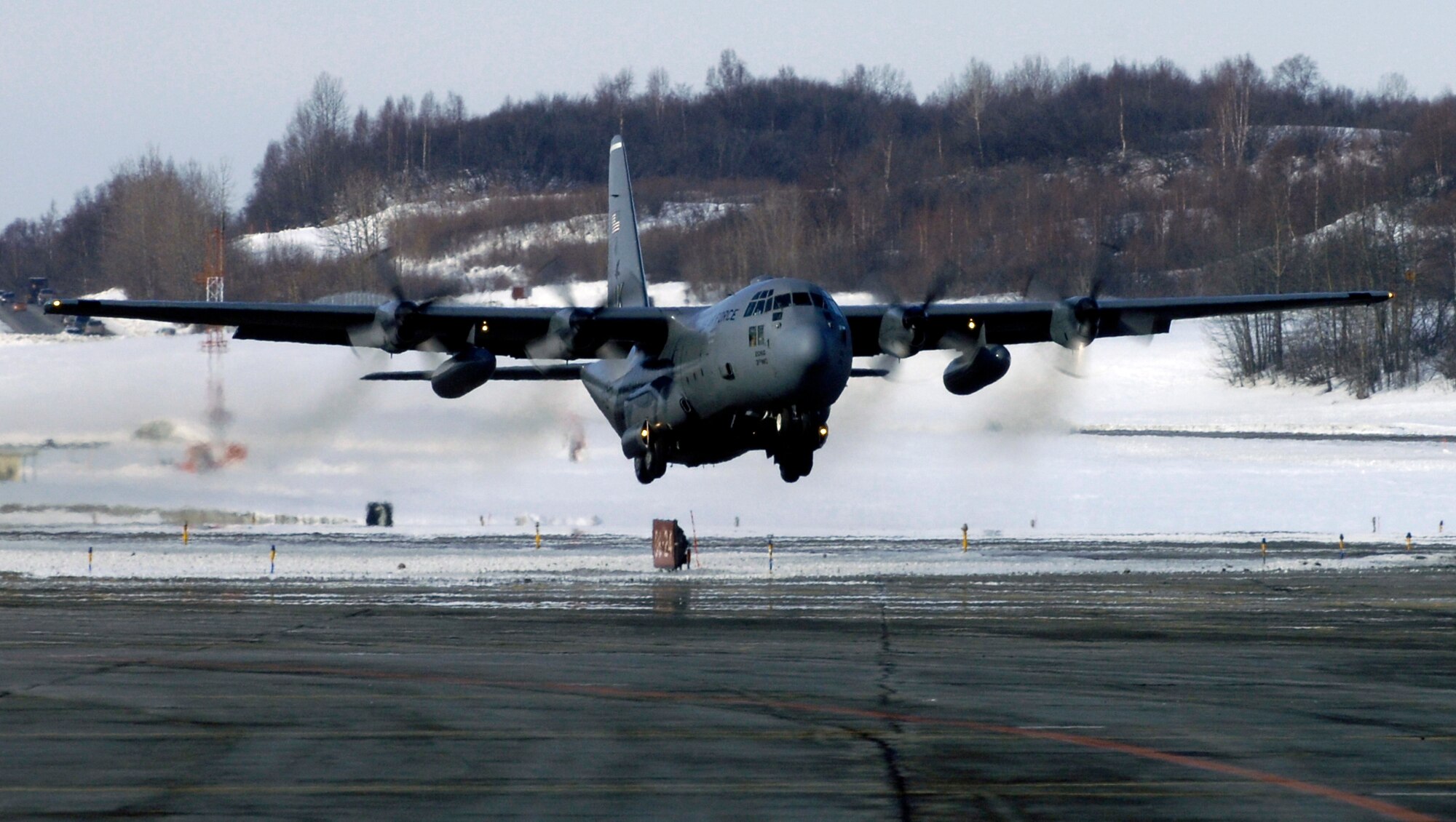 ELMENDORF AIR FORCE BASE, Alaska -- The last C-130 from 517th Airlift Squadron takes off from here heading to Yokota Air Base, Japan. After 43 years of continuous service in Alaska, the C-130 is leaving to fulfill a reorganization of aircraft basing to make its mission more efficient. The 517th AS is converting C-17s and the C-130s relocating to Yokota AB will replace the "E" models and will add two more "H" models to Dyess Air Force Base, Texas, fleet. (U.S. Air Force photo by Airmen 1st Class Jonathan Steffen)