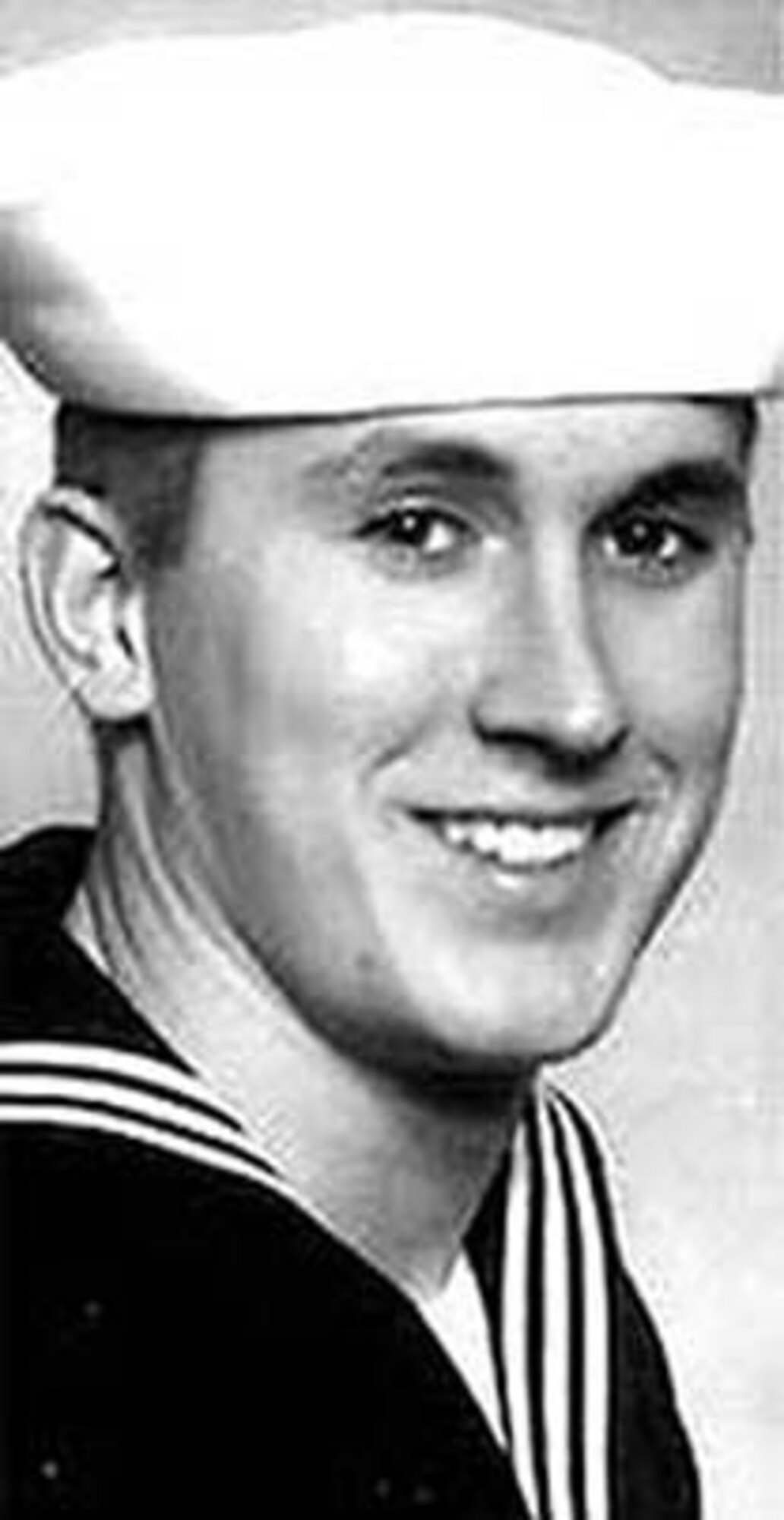010507 -- MISAWA AIR BASE, Japan -- Petty Officer Matthew Draughon, a U.S. Navy diver onboard the USS Safeguard, was lost on May 5, 2001, during the dive recovery operation of a Misawa Air Base, Japan, F-16DJ aircraft that crashed into the Pacific Ocean.  He was posthumously awarded the Navy and Marine Corps Medal, second highest non-combatant medal awarded by the U.S. Department of the Navy. (Courtesy photo)