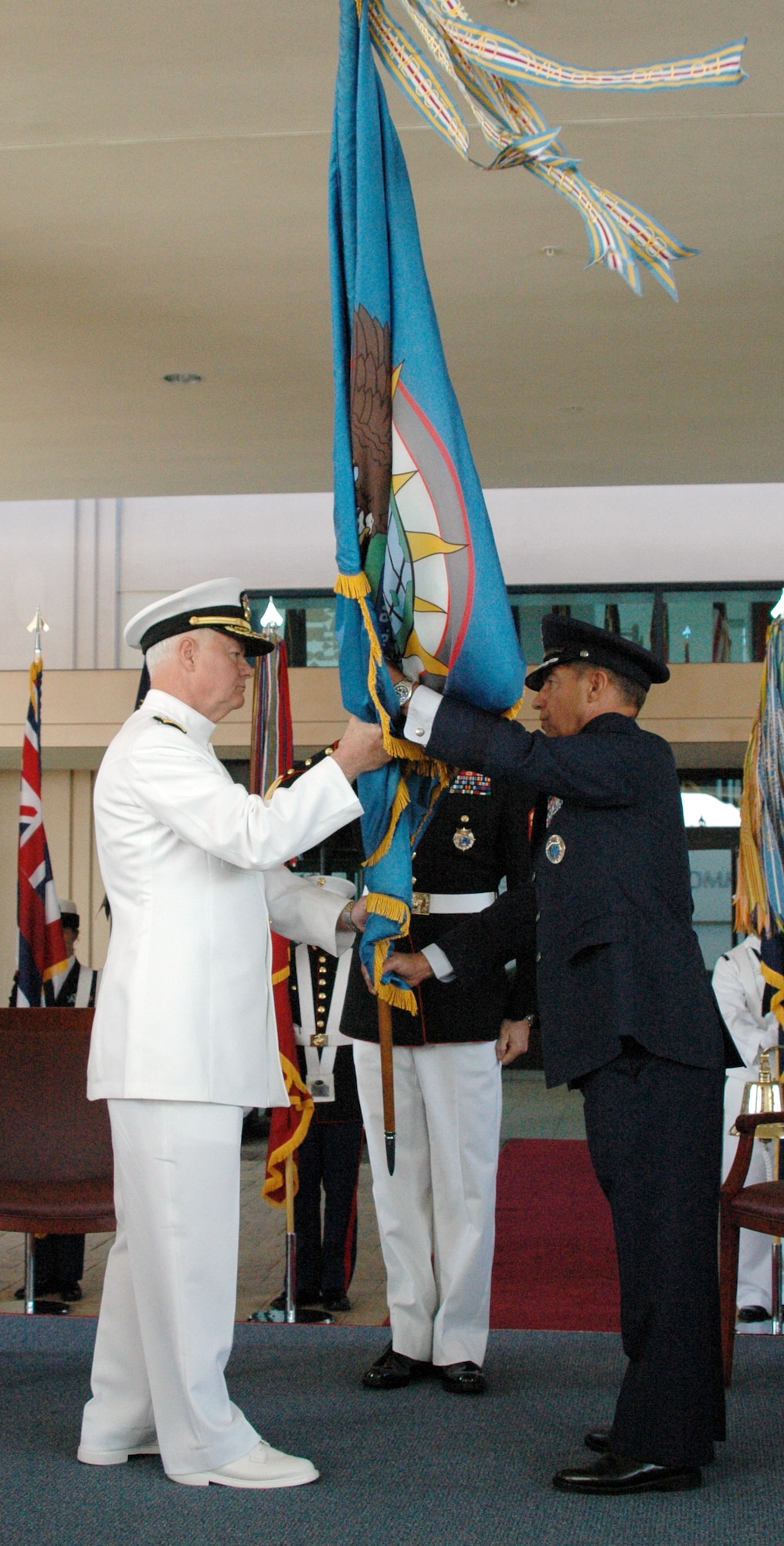 CAMP H.M. SMITH, Hawaii -- Admiral Timothy J. Keating, left, former commander of U.S. Northern Command, assumes command of U.S. Pacific Command from Lt. Gen. Daniel P. Leaf in a ceremony here today. (U.S. Pacific Command photo by U.S. Navy MC3 Elisia Gonzalez) (Released)

