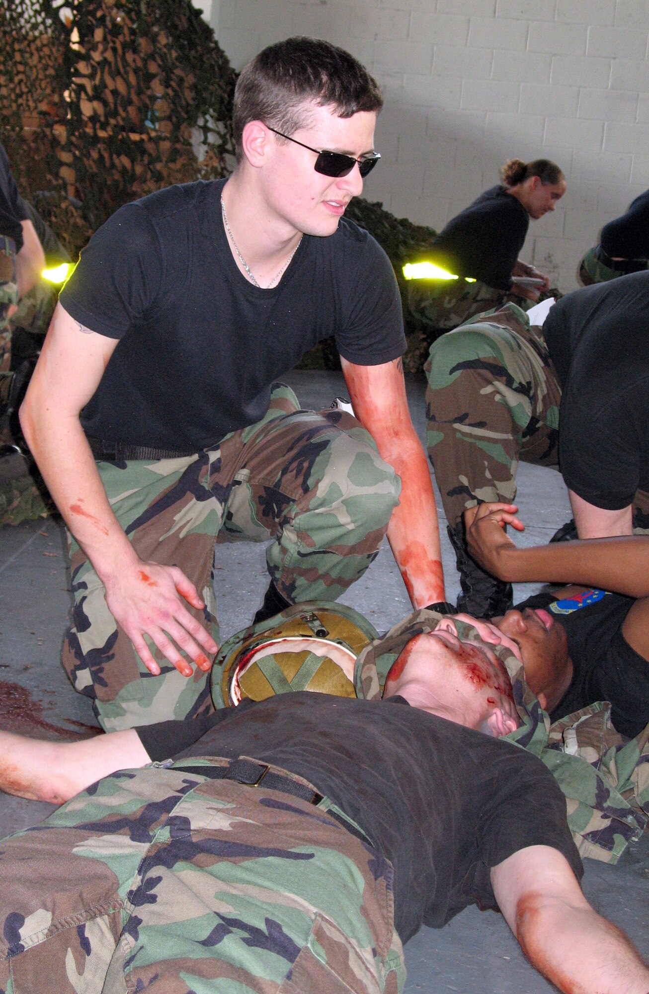 Airman 1st Class Josh Potter puts his self aid-buddy care skills to the test during a medical readiness exercise as part of Airman Readiness Day March 23 at Lajes Field, the Azores. (U.S. Air Force photo/Airman 1st Class Nicholas Stowers)