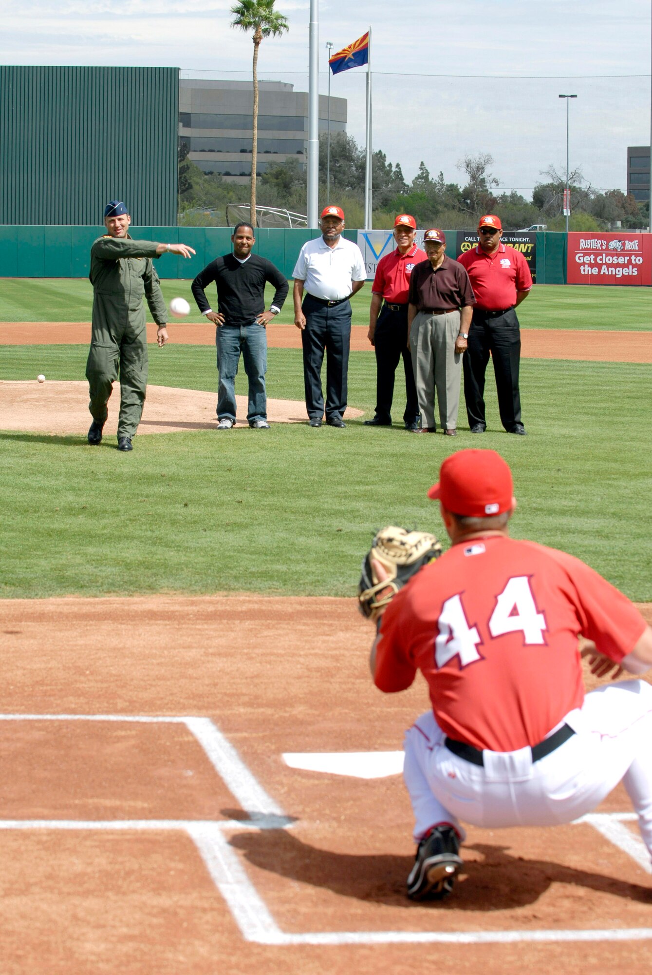 Brig. Gen. Noel T. "Tom" Jones throws the ceremonial first pitch for the Arizona Diamondbacks and Anaheim Angels game at Tempe Diablo Stadium, Tempe, Ariz., March 21. The game was one of many local events supporting Air Force Week, which runs March 19 to 23. General Jones is the commander of the 56th Fighter Wing at Luke Air Force Base, Ariz. (U.S. Air Force photo/Senior Airman Christopher Hummel)