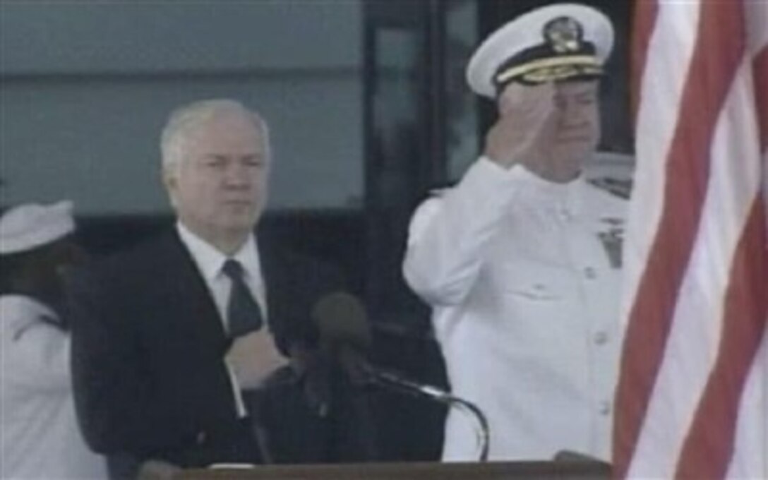 Defense Secretary Robert M. Gates and Navy Adm. Timothy J. Keating render honors during the U.S. Pacific Command change of command ceremony at Camp H.M. Smith, Hawaii, March 26, 2007. Keating succeeds Navy Adm. William J. Fallon, who took command of U.S. Central Command on March 16.