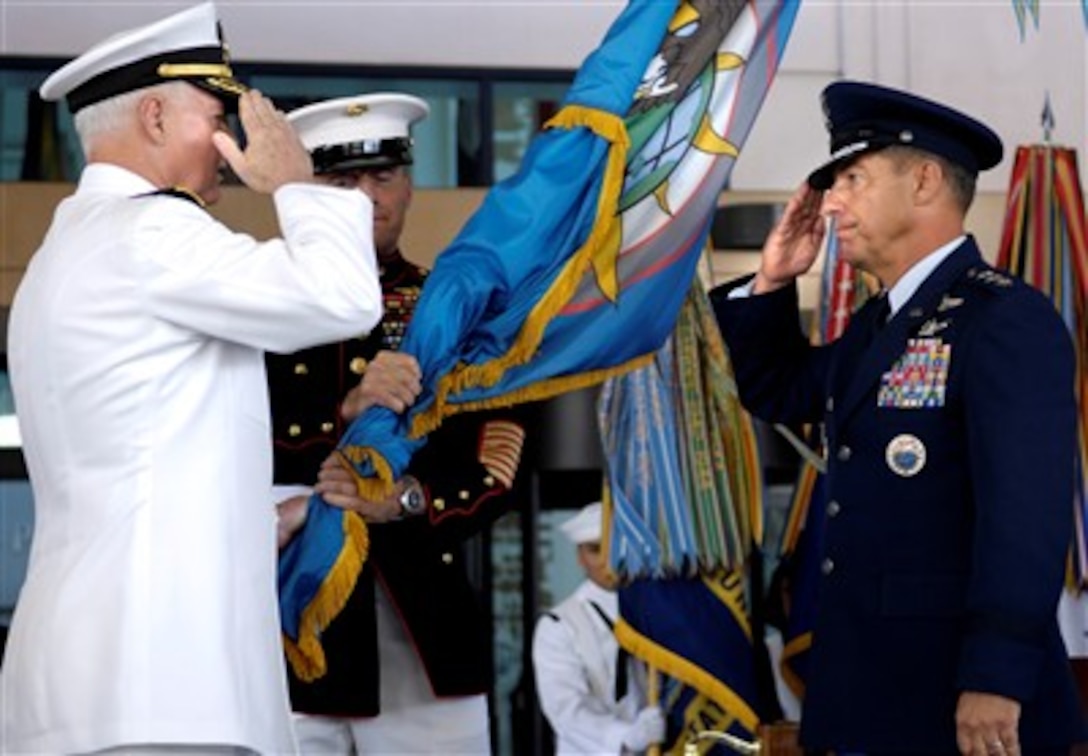 U.S. Navy Adm. Timothy J. Keating, left, and U.S. Air Force Lt. Gen. Daniel Leaf salute during the symbolic passing of the flag as part of the U.S. Pacific Command change of command ceremony at Camp Smith, Hawaii, March 26, 2007.