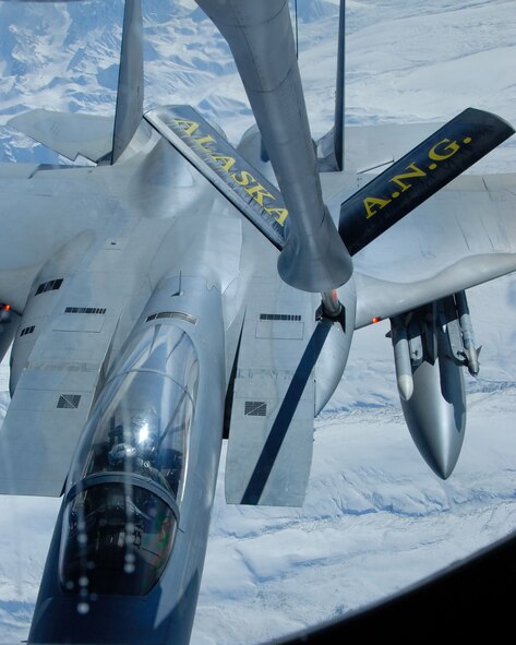 EIELSON AIR FORCE BASE, Alaska--A 12th Fighter Squadron F-15C from Elmendorf AFB, Alaska, refuels behind a 168th Air Refueling Squadron KC-135 Stratotanker over the Pacific Alaska Range Complex on March 26.  (U.S. Air Force photo by Master Sgt. Robert Wieland) (Released)