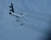 EIELSON AIR FORCE BASE, Alaska--A RC-135 Cobra Ball aircraft from the 55th Reconnaissance Wing, Offutt AFB, Neb., refuels behind a 168th Air Refueling Squadron KC-135 Stratotanker over the Pacific Alaska Range Complex on March 26.  (U.S. Air Force photo by Master Sgt. Robert Wieland) (Released)