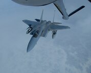 EIELSON AIR FORCE BASE, Alaska--A 12th Fighter Squadron F-15C from Elmendorf AFB, Alaska, refuels behind a 168th Air Refueling Squadron KC-135 Stratotanker over the Pacific Alaska Range Complex March 26.  (U.S. Air Force photo by Master Sgt. Robert Wieland) (Released)
