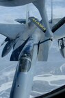 EIELSON AIR FORCE BASE, Alaska--A 12th Fighter Squadron F-15C from Elmendorf AFB, Alaska refuels behind a 168th Air Refueling Squadron KC-135 Stratotanker over the Pacific Alaska Range Complex on March 26.  (U.S. Air Force photo by Master Sgt. Robert Wieland) (Released)