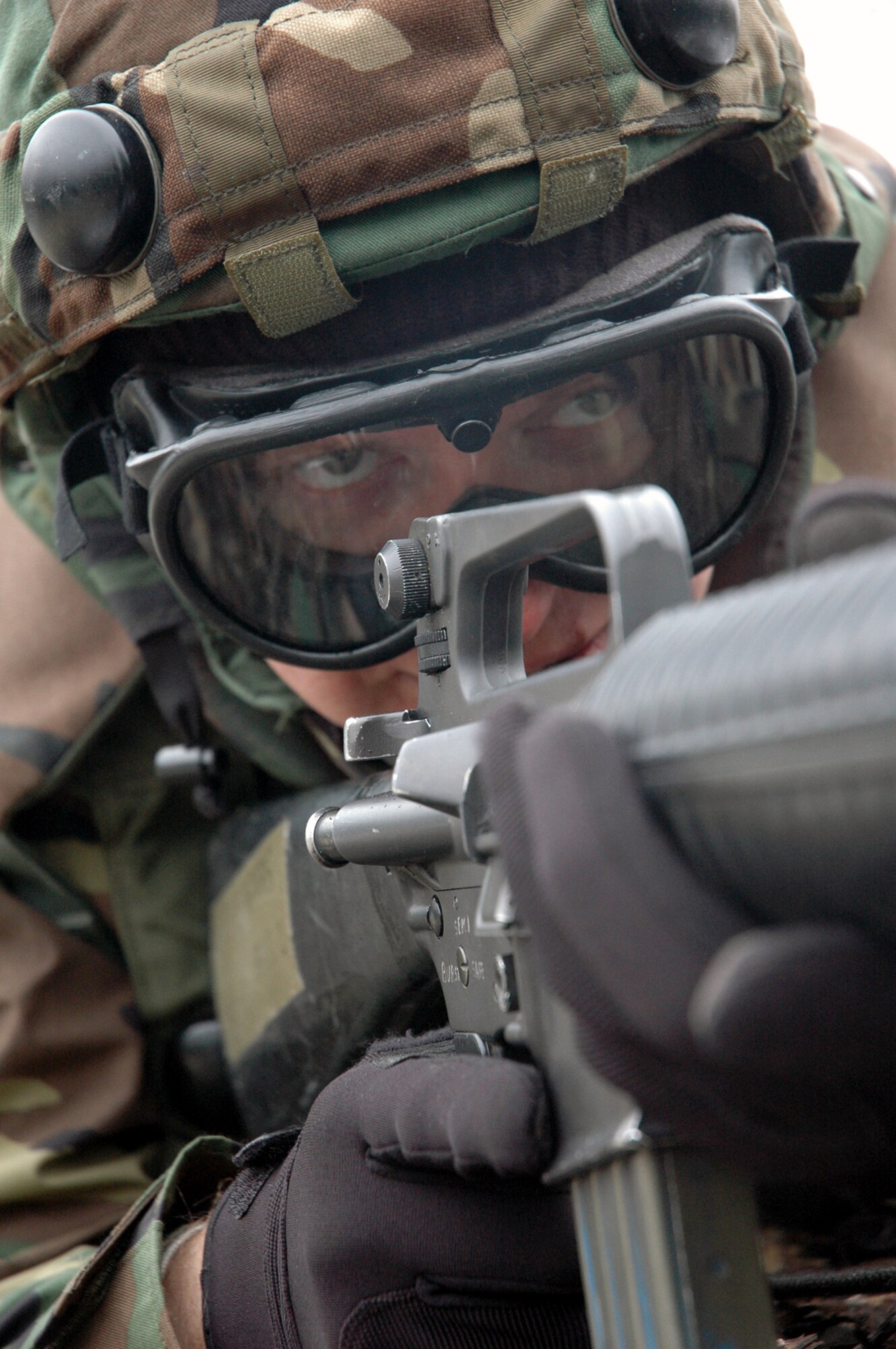 Airman 1st Class Robert Barnes, a keyboard player with the Band of the Air Force Reserve, Robins Air Force Base, Ga., learns attack response skills at the Air Force Advanced Contingency Skills Training Course at Fort Dix, N.J., on March 19, 2007.  The course, taught by the U.S. Air Force Expeditionary Center's 421st Combat Training Squadron, prepared nearly 300 Airmen for upcoming deployments. Airman Barnes was one of 10 Air Force Reserve Command band members attending the training.  This is the first time Air Force band members have received this type of combat skills training. (U.S. Air Force Photo/Tech. Sgt. Scott T. Sturkol)