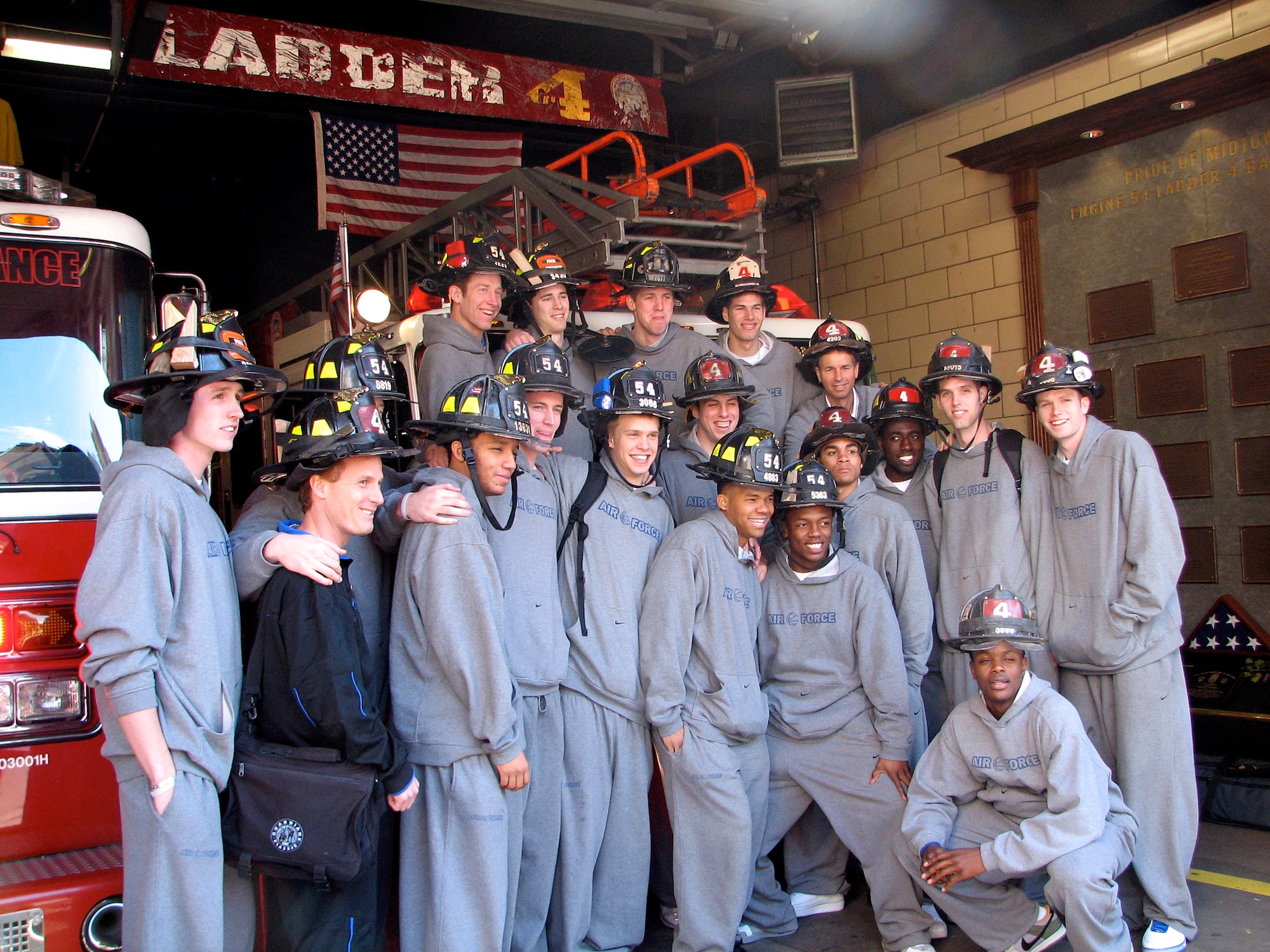 The U.S. Air Force Academy men's basketball team poses for a photo March 25 during a tour of the Engine 54 fire station in New York City. The team is playing in the National Invitation Tournament semifinals March 27 against the Clemson Tigers in Madison Square Garden. (U.S. Air Force photo/Staff Sgt. Steve Grever) 