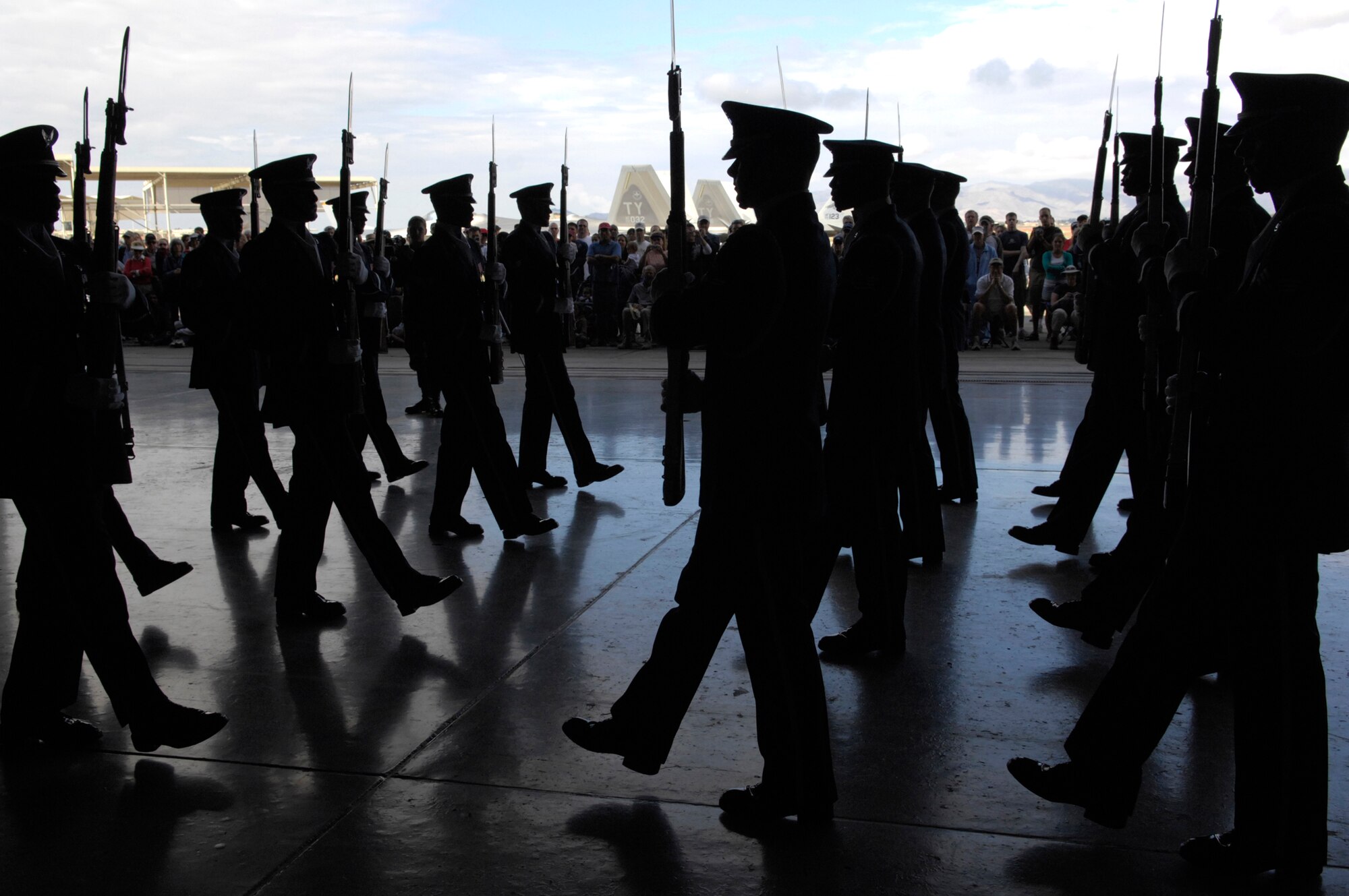 The United States Air Force Honor Guard Drill Team performs March 24 during the Luke Air Force Base, Ariz., air show. The drill team is the traveling component of the Air Force Honor Guard and tours Air Force bases worldwide showcasing the precision of today's Air Force to recruit, retain and inspire Airmen for the Air Force mission. (U.S. Air Force photo/Airman 1st Class Rusti Caraker) 