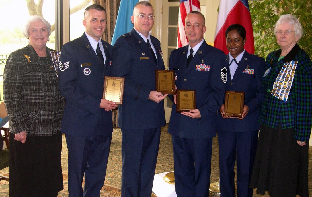 The local Maj. Francis Grice Daughters of the American Revolution Chapter recognizes four Sheppard personnel annually as a way to give back to the men and women who serve in the military. The chapter recognized four Sheppard training instructors March 24 at a luncheon at the Wichita Falls Country Club. Those receiving awards included Maj. Wanda Parham-Bruce of the 383rd Training Squadron, Master Sgt. David Davis of the 383rd TRS, Tech. Sgt. Randal Pionek of the 372nd TRS and Staff Sgt. David Bard of the 363rd TRS. Pictured are, from left to right, DAR Texas State Vice RegentJoy Hagge, Sergeant Bard, Lt. Col. Russell Tutty, commander of the 372nd TRS accepting on behalf of Sergeant Pionek, Sergeant Davis, Major Parham-Bruce and Susan MacRae, the military chairwoman of the local DAR chapter. (U.S. Air Force photo/Debi Smith)