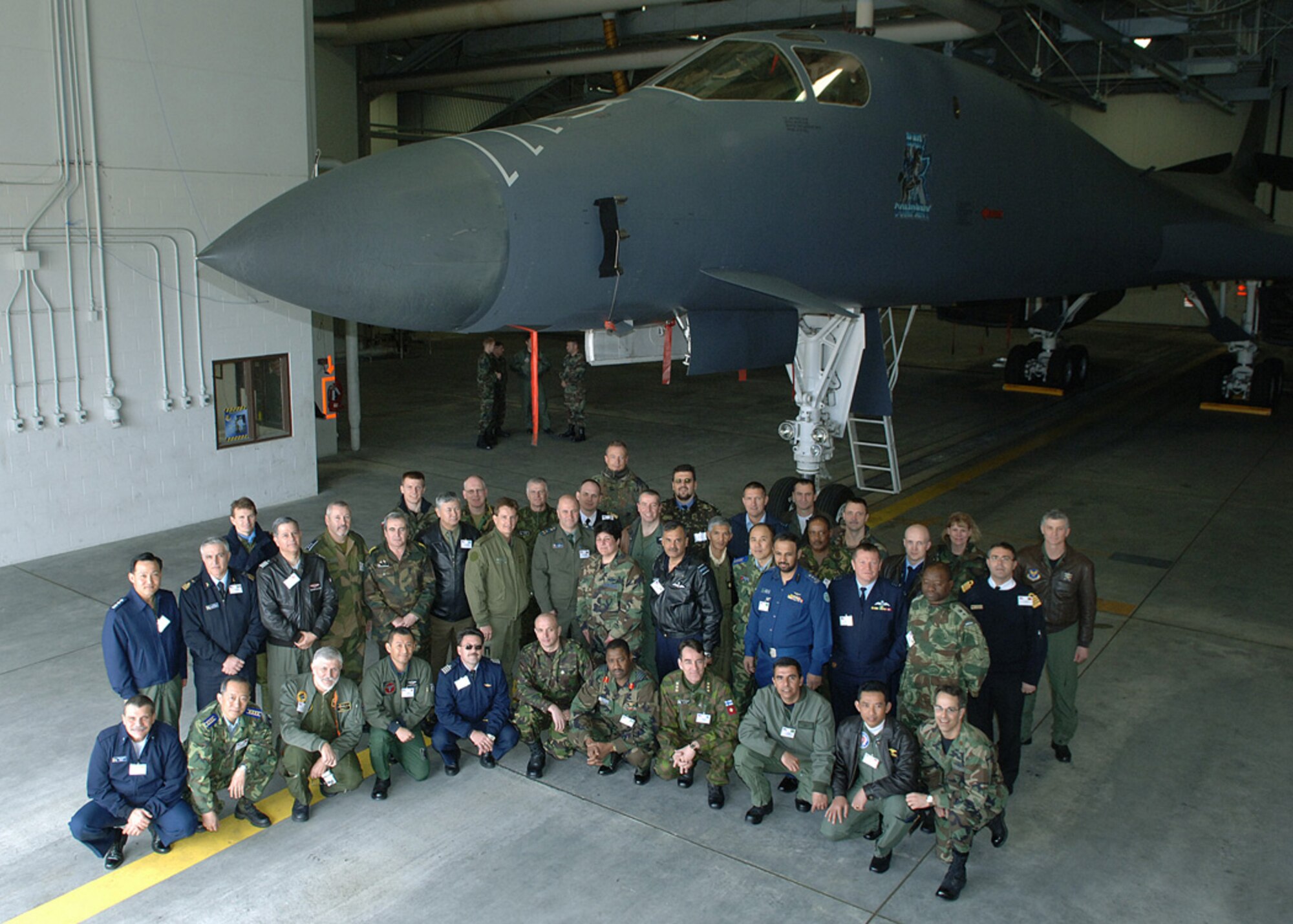 An international air attaché comprised of 46 foreign officers from various allied nations visited here March 21 and 22 to facilitate international relations among the bomber community.
The team’s focus was centered on the global strike capability unique to the B-1 Lancer. The air attaché  had previously visited Barksdale Air Force Base and Offutt Air Force Base before coming to Ellsworth.
While at Ellsworth, the air attaché toured the base and its facilities, saw a B-1 up-close and personal via a static display and toured Mount Rushmore. (U.S. Air Force Photo/Airman 1st Class Angela Ruiz)