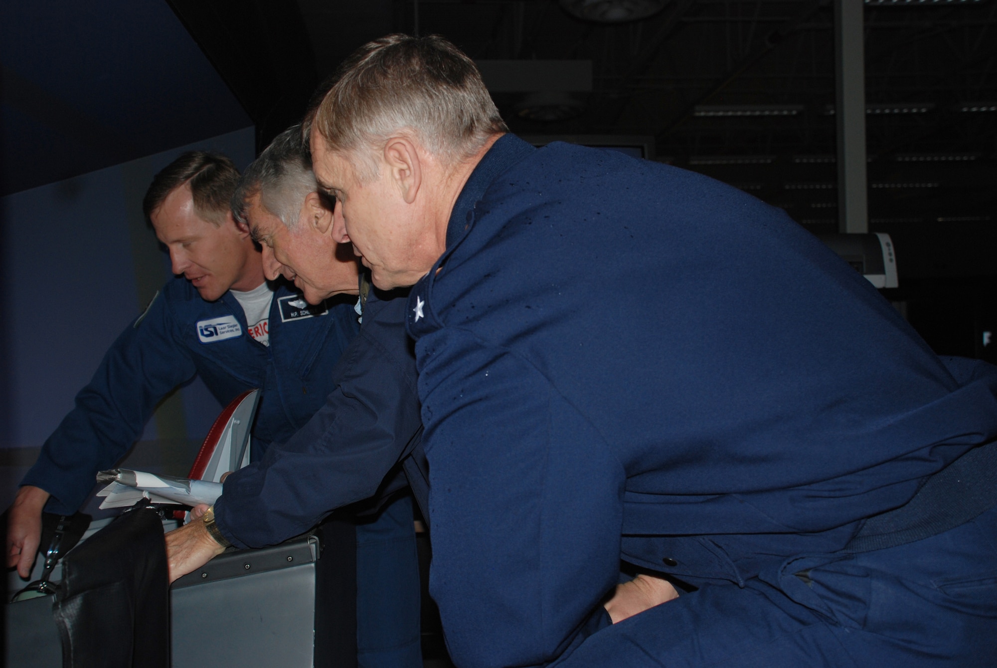 Maj. Gen. Stanley Gorenc, former Euro-NATO Joint Jet Pilot Training commander from Nov. 6, 1997, to May 15 1999, and retired Col. Larry Pritchett, ENJJPT commander from July 15, 1980, to Feb. 24, 1982, inspect the pilot training flight simulators as part of the ENJJPT 25th Anniversay Celebration March 26. (U.S. Air Force photo/Airman 1st Class Jacob Corbin)