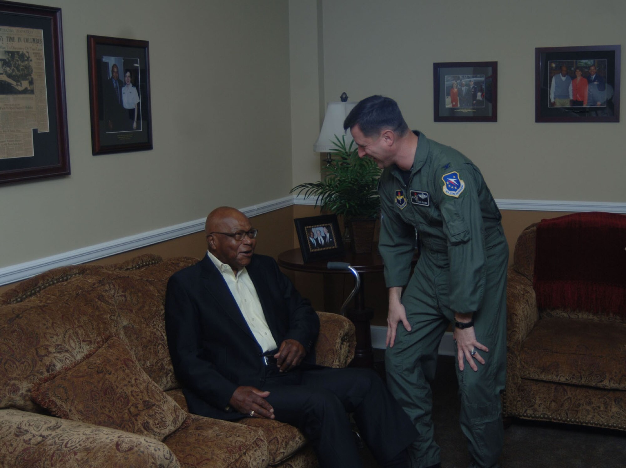 Colonel Mark Baker, 14th Flying Training Wing vice commander, greets Happy Irby in the Happy Lounge. Columbus Air Force Base officials helped him celebrated his 92nd birthday March 27.