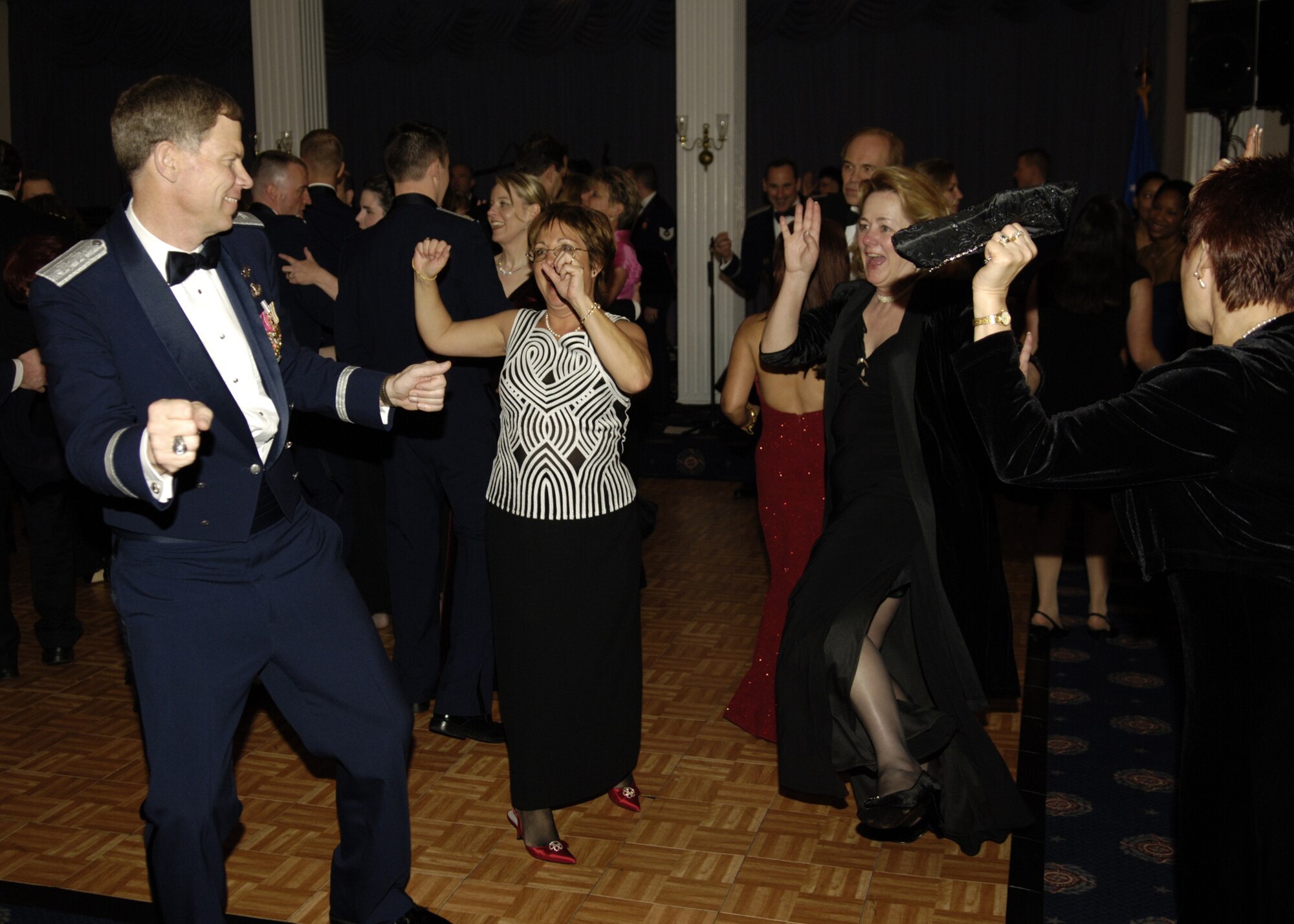 Members of the Air Force community dance the night away at the fourth annual Air Force Charity Ball March 24 at the Bolling Clubs. (U.S. Air Force photo by Donna H. Parry)