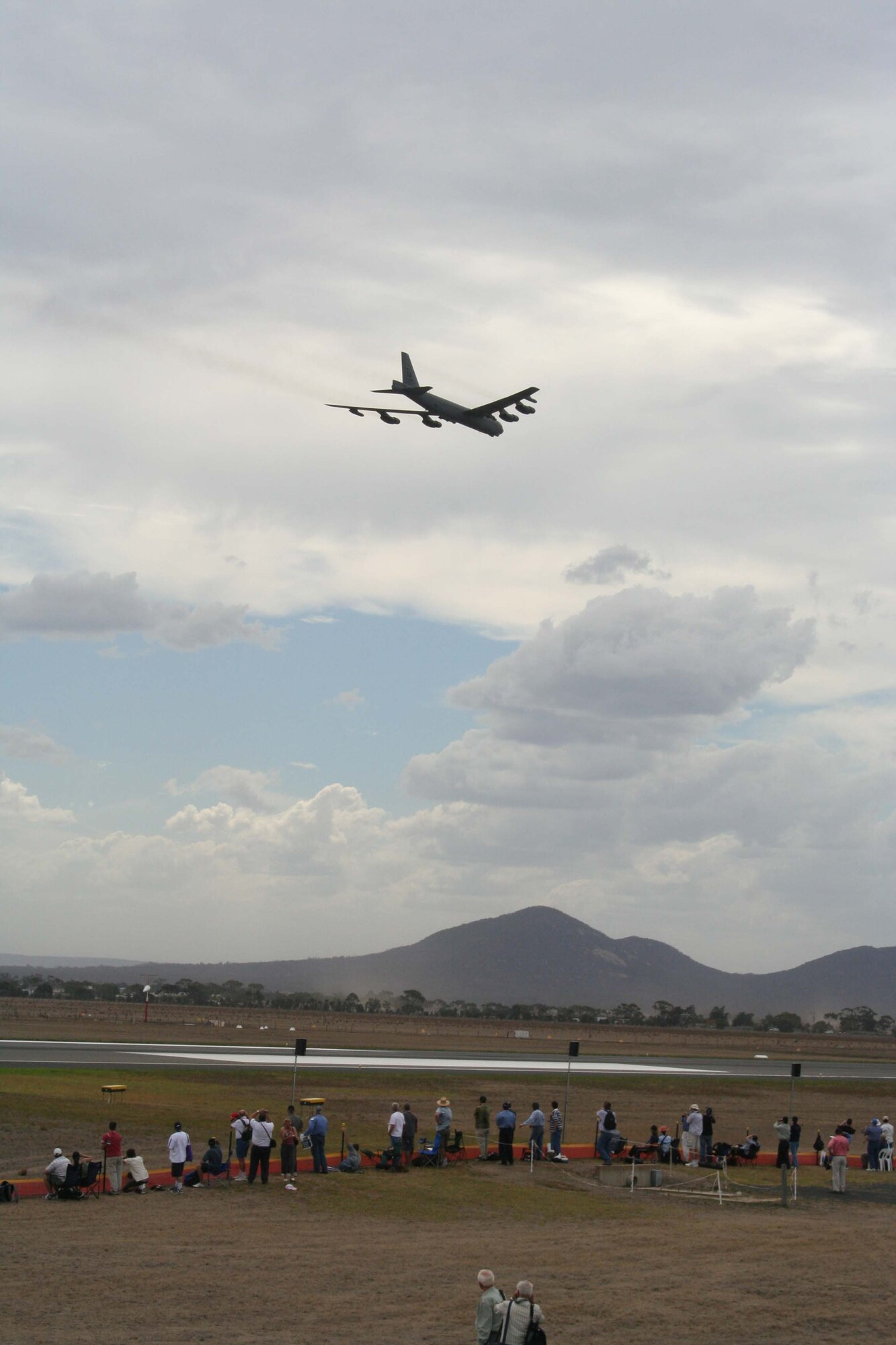 A B-52 Stratofortress flies over the flightline at Avalon Airport March 24 in support of the Australian International Airshow 2007. B-52s are deployed from Barksdale Air Force Base, La., to Andersen Air Base, Guam, as part of the Pacific Command's continuous bomber presence in the Pacific region. One B-52 flew to the Darwin Airport in northern Australia to perform in support of the air show. (U.S. Air Force photo/Capt. Yvonne Levardi)