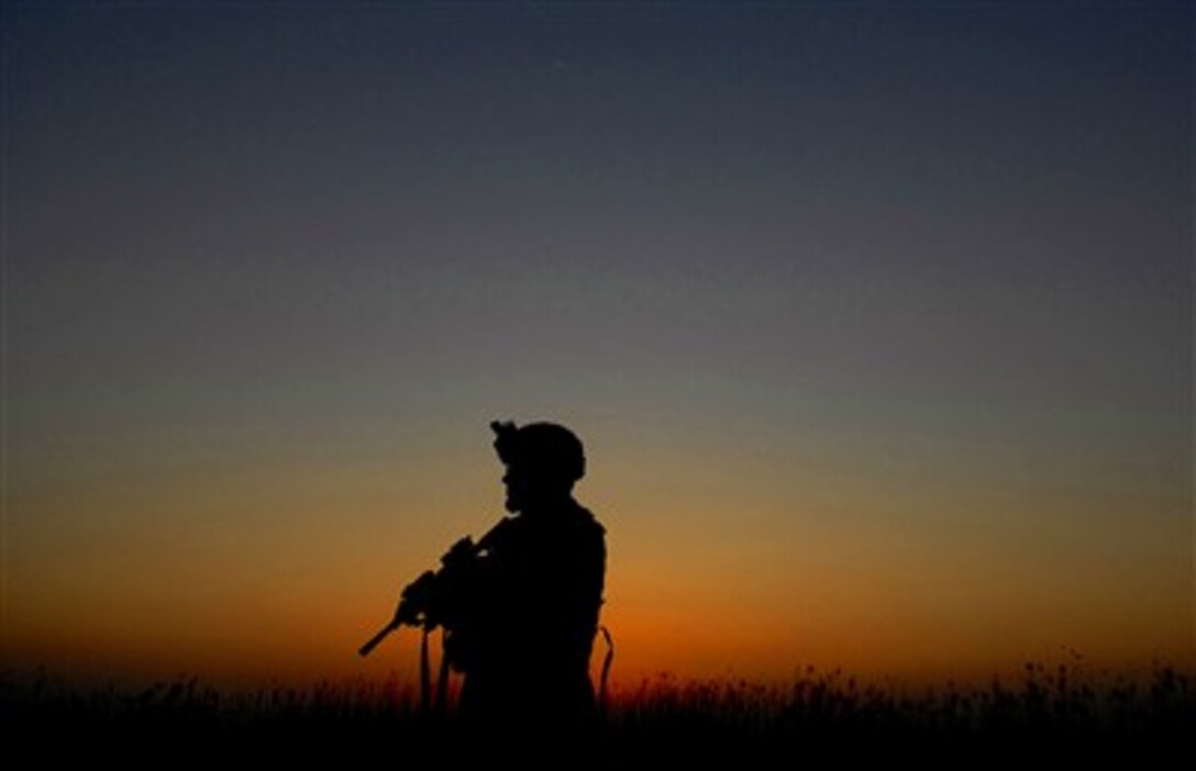 U.S. Army Spc. Jarrod MacEachern provides on the ground security while conducting a tactical check point near Patrol Base Doria, Iraq, March 21, 2007. MacEachern is assigned to the 1st Platoon Alpha Company, 2nd Battalion, 27th Infantry Regiment, 25th Infantry Division, Schofield Barracks, Hawaii.