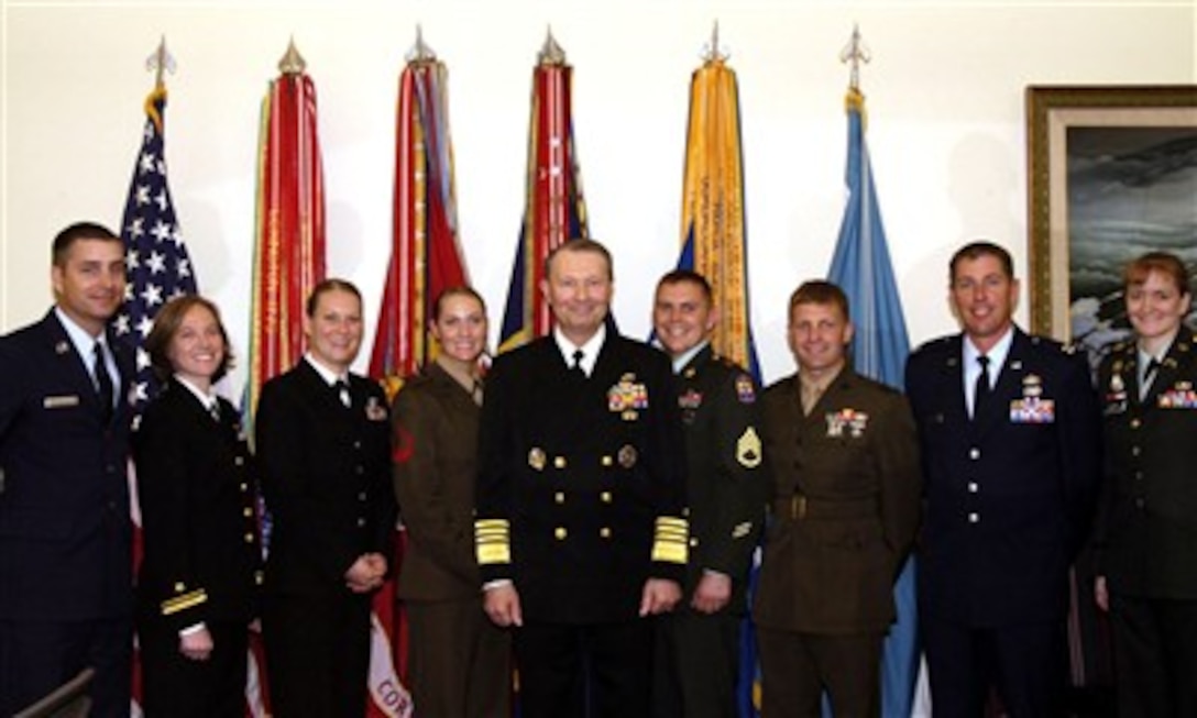 Vice Chairman of the Joint Chiefs of Staff U.S. Navy Adm. Edmund P. Giambastiani (center) greeted the new Why We Serve speakers in his office March 28, 2007. They have all recently returned from deployment in support of the global war on terror. They will share their stories of why they serve in the military with the American public through different speaking opportunities.
