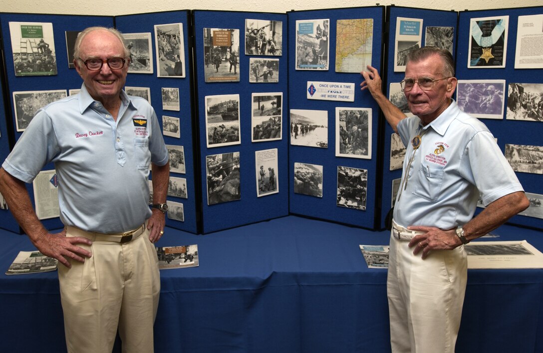 Retired Master Gunnery Sgt. Robert F. Talmadge, right, and retired Navy Capt. Davey Crockett, left,  both Korean War veterans, came to U.S. Marine Corps Forces, Pacific to share their stories and first-hand experiences during the war that embodied the courage and mental toughness of Marines of their day, March 29.