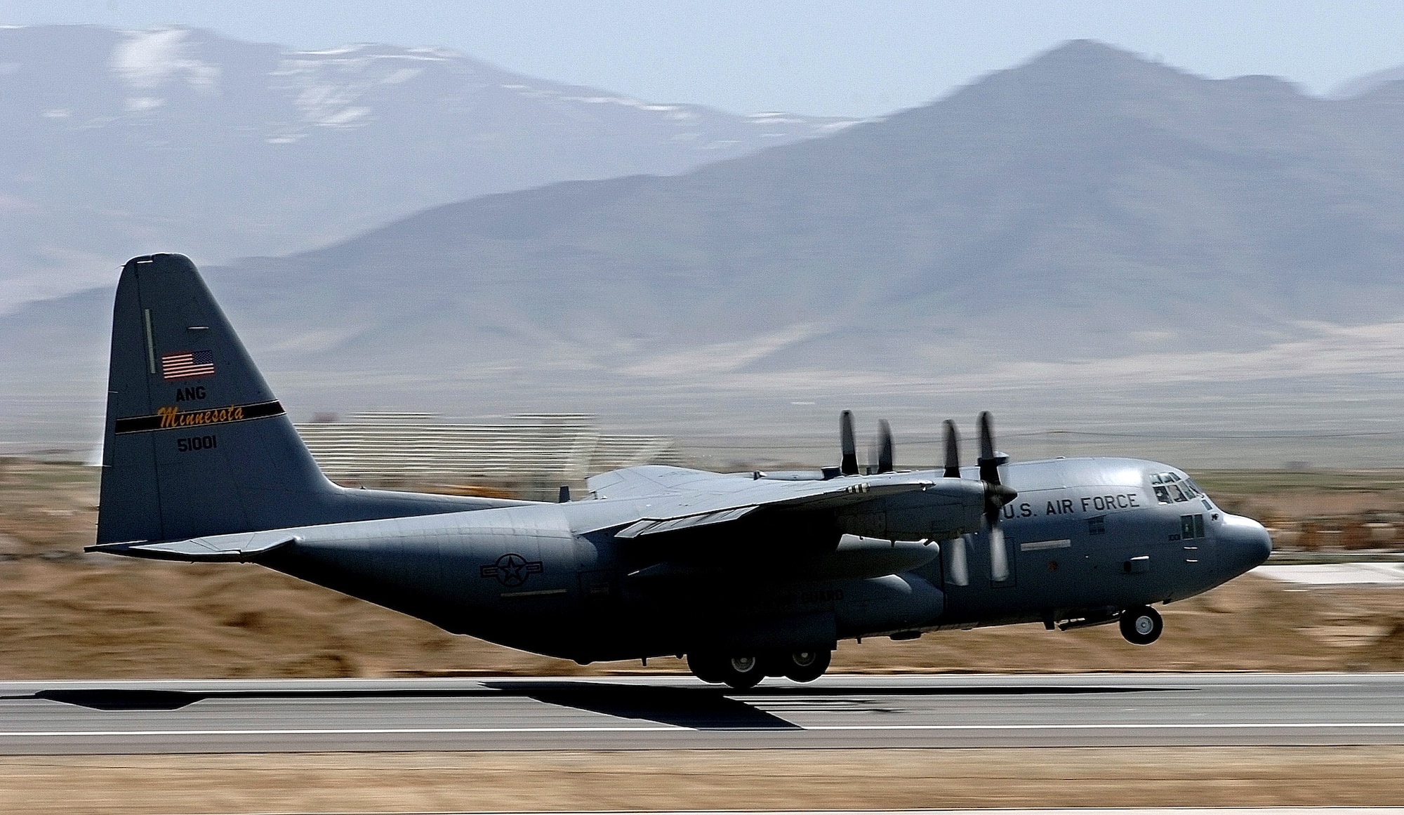 A C-130 Hercules takes off from Bagram Air Base, Afghanistan, March 27 in support of Operation Enduring Freedom. The Air National Guard aircrew is providing critical supplies U.S. ground forces in Afghanistan. (U.S. Air Force photo/Chief Master Sgt. Mike Annis) 