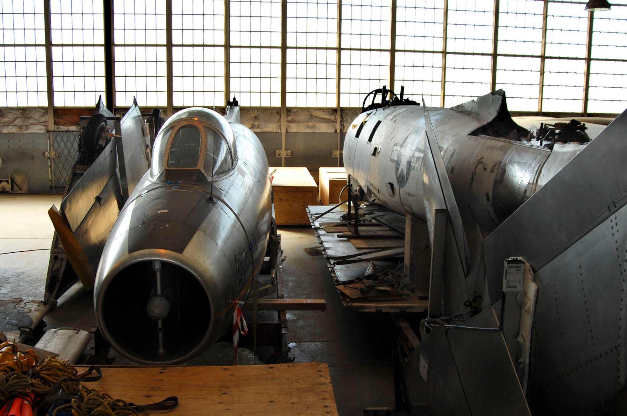 DAYTON, Ohio (02/2007) -- Mystere IVA (left) and F-86A (right) in the restoration hangar of the National Museum of the U.S. Air Force. (U.S. Air Force photo)