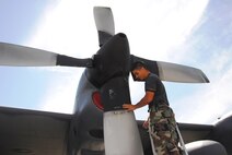 Staff Sgt. Nathan Roden inspects the propeller on an MC-130H Combat Talon II of the 15th Special Operations Squadron at Hurlburt Field, Fla.  Sergeant Roden is a jet engine mechanic with the 1st Special Operations Aircraft Maintenance Squadron.  Air Force Special Operations Command dominated the 2006 Air Force safety award program, garnering the service?s top awards for best major command safety record, most effective MAJCOM-level flight safety program and best ground safety program. (Air Force photo by Chief Master Sgt. Gary Emery)