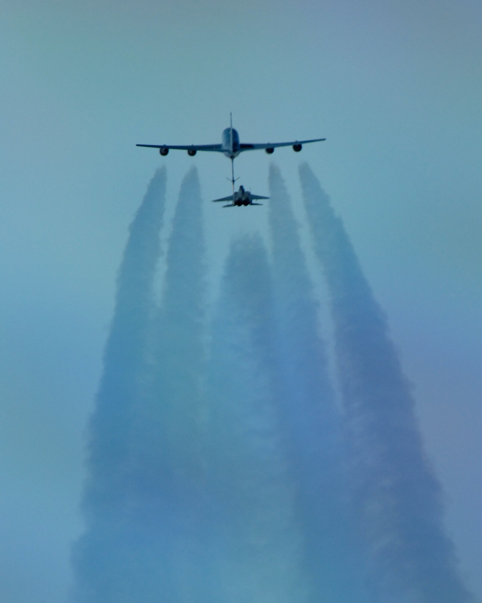 A 12th Fighter Squadron F-15 Eagle from Elmendorf Air Force Base, Alaska, refuels behind a KC-135 Stratotanker March 26 over the Pacific Alaska Range Complex. The KC-135 is from the 168th Air Refueling Squadron at Eielson AFB, Alaska. It also provides aerial refueling support to Air Force, Navy and Marine Corps aircraft as well as aircraft of allied nations. (U.S. Air Force photo/Master Sgt. Robert Wieland) 
