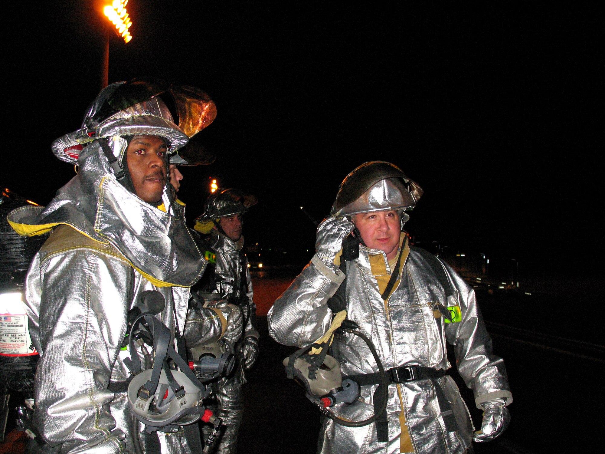 Staff Sgt. Christopher Dooley and Tech. Sgt. Chester Berry respond to a fuel spill exercise March 27 on the flightline at Lajes Field, Azores. The exercise is part of Lajes Field's Operational Readiness Inspection that tests the readiness of Airmen in emergency situations. (U.S. Air Force photo/Airman 1st Class Shannon Ofiara)